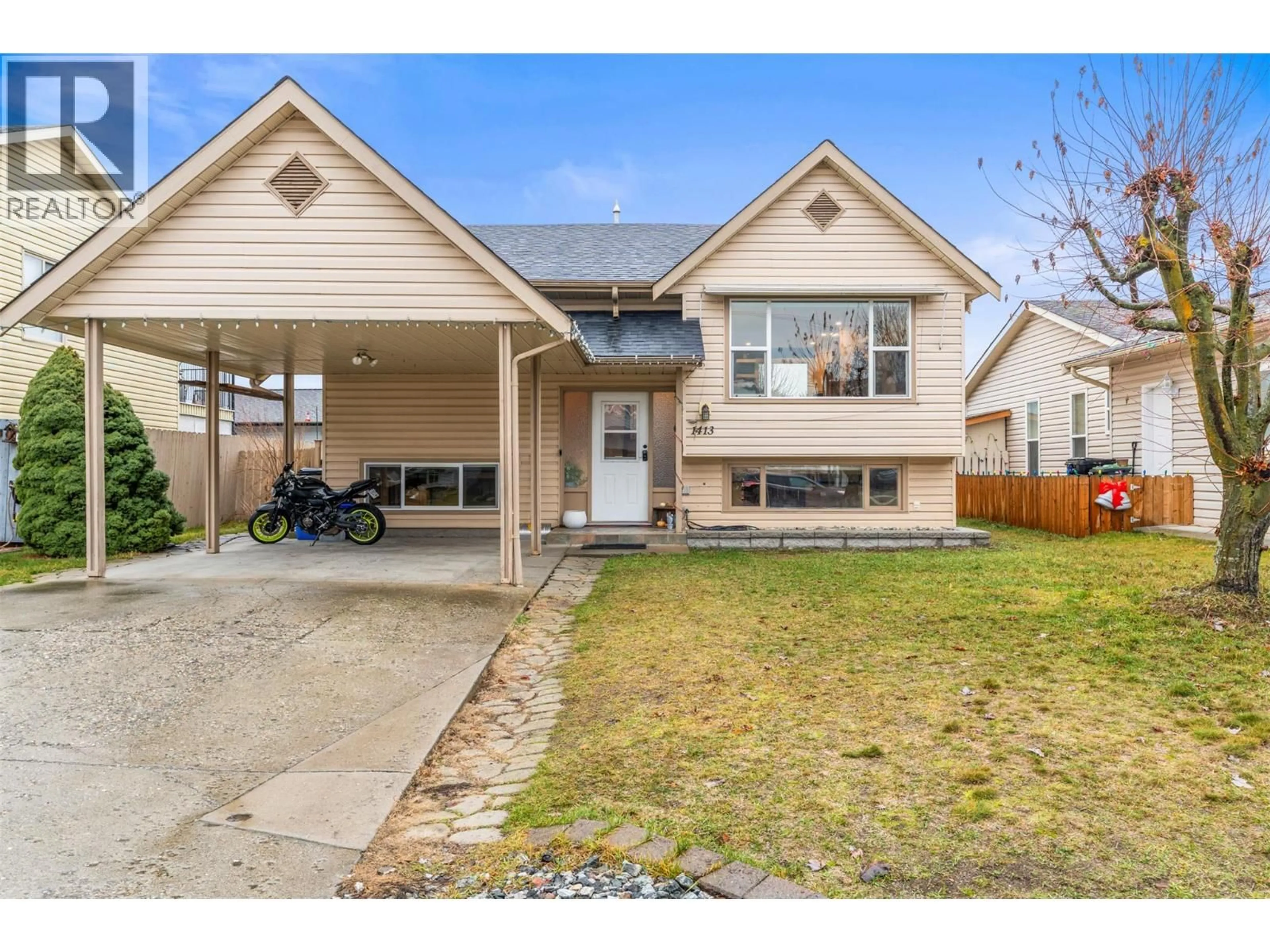 Home with vinyl exterior material, street for 1413 12TH STREET, Vernon British Columbia V1T2S6
