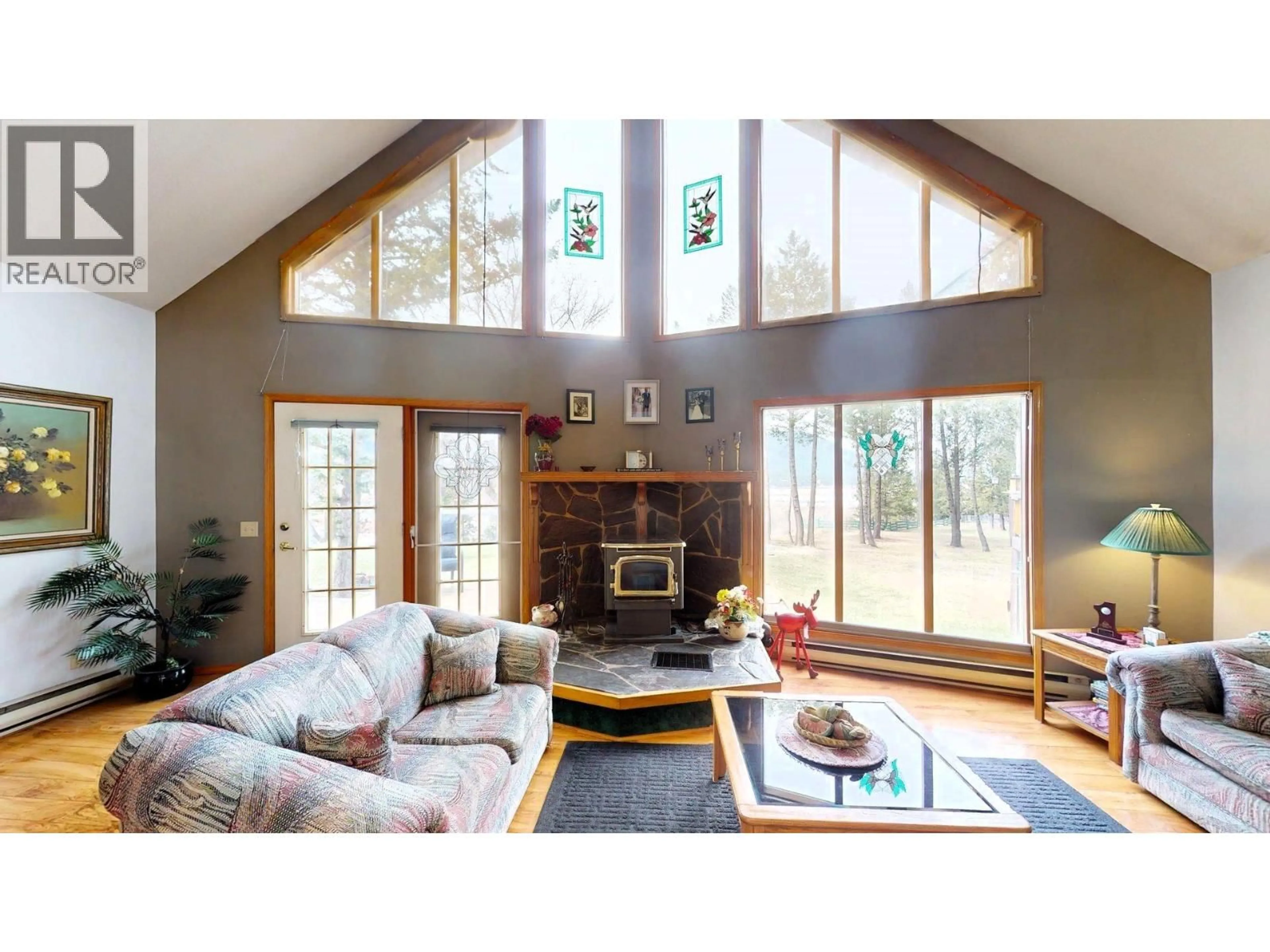 Living room with furniture, wood/laminate floor for 7319 GLACIER DRIVE, Radium Hot Springs British Columbia V0A1M0