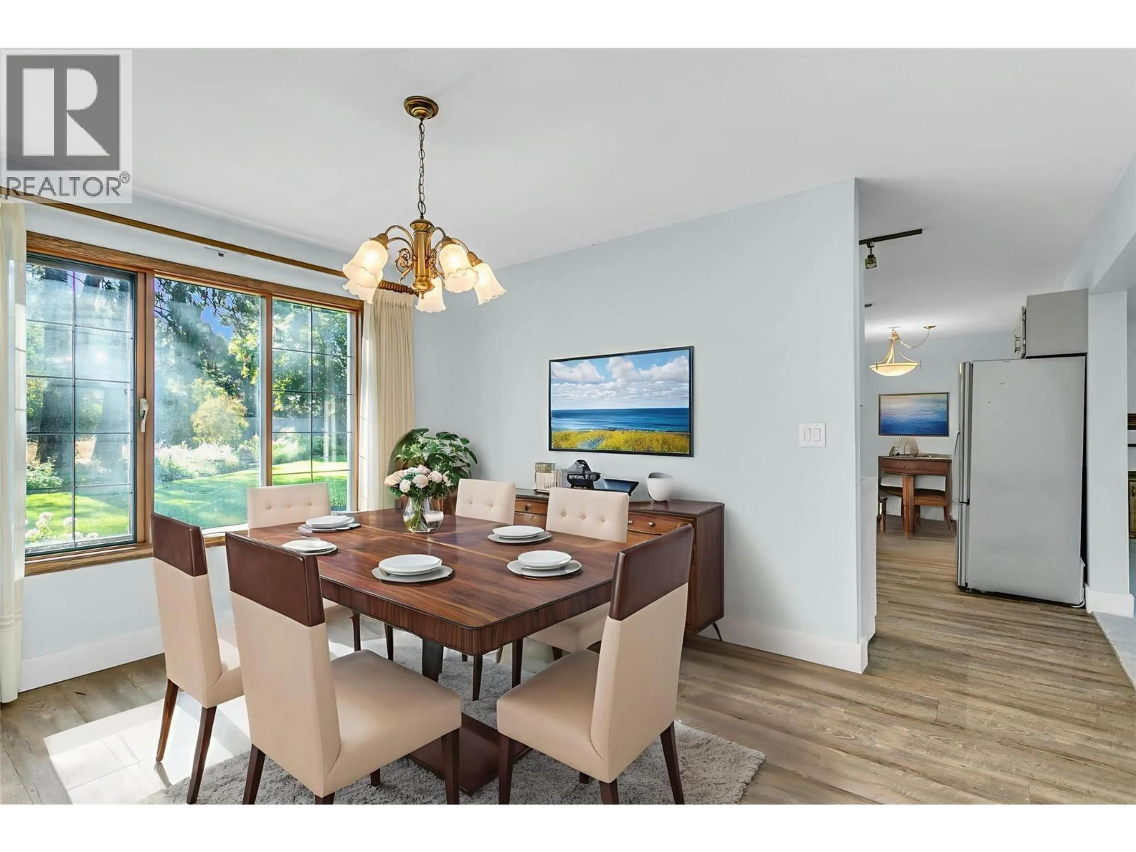 Dining room, wood/laminate floor for 2605 ALBERTA COURT, Kelowna British Columbia V1W2X8