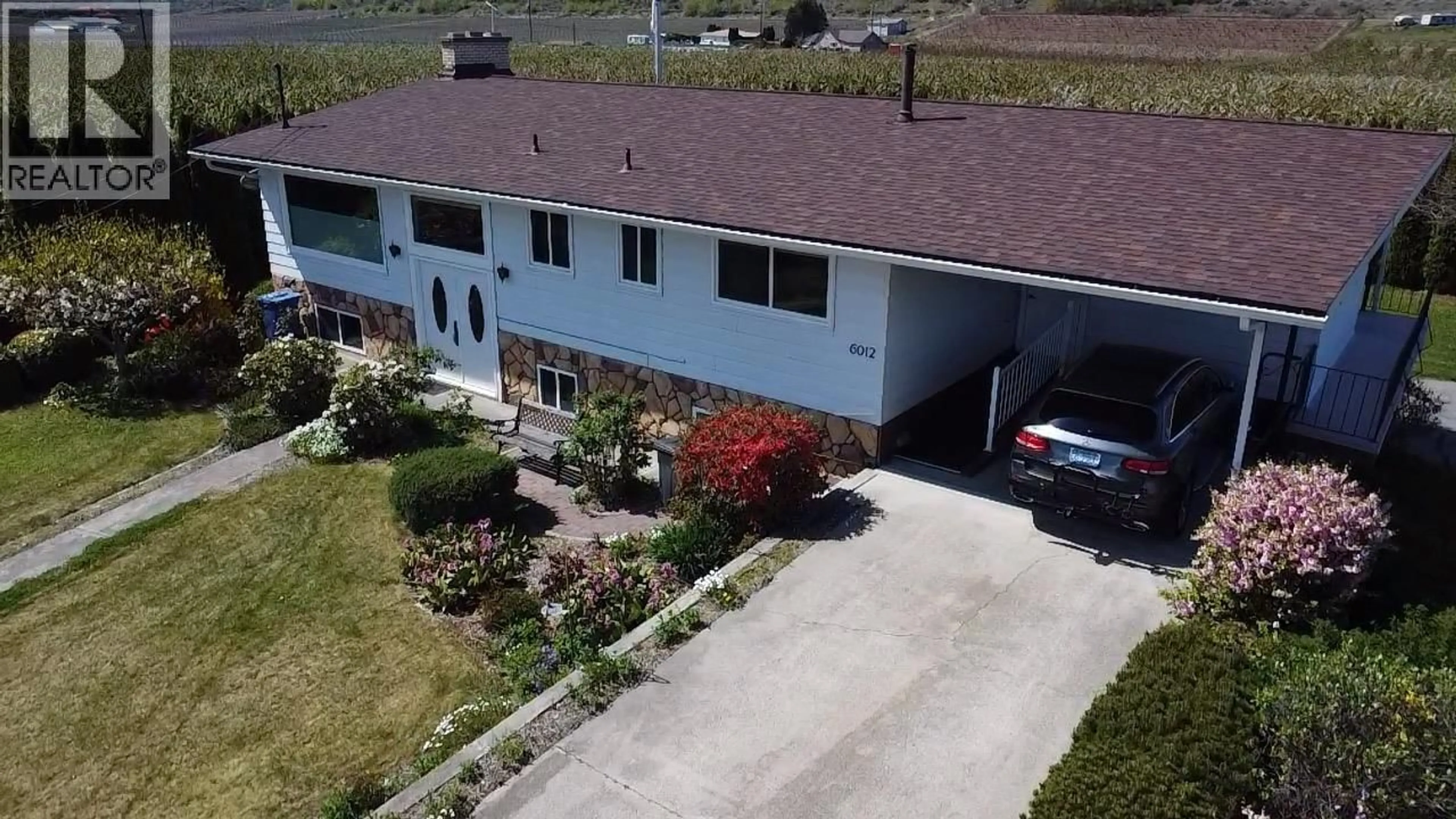 A pic from outside/outdoor area/front of a property/back of a property/a pic from drone, unknown for 6012 107TH STREET, Osoyoos British Columbia V0H1V2