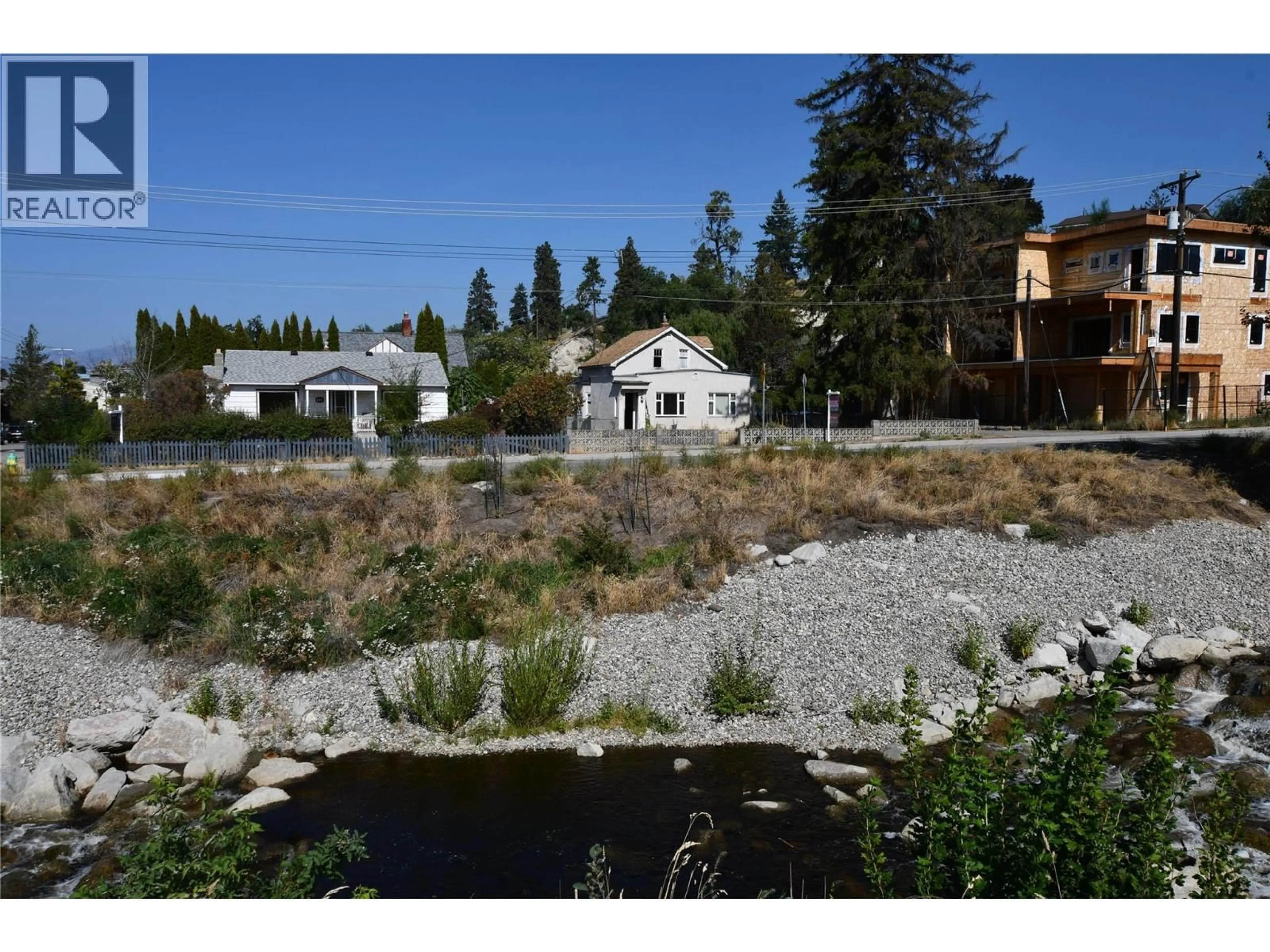 A pic from outside/outdoor area/front of a property/back of a property/a pic from drone, water/lake/river/ocean view for 421 WADE AVENUE EAST, Penticton British Columbia V2A1T1