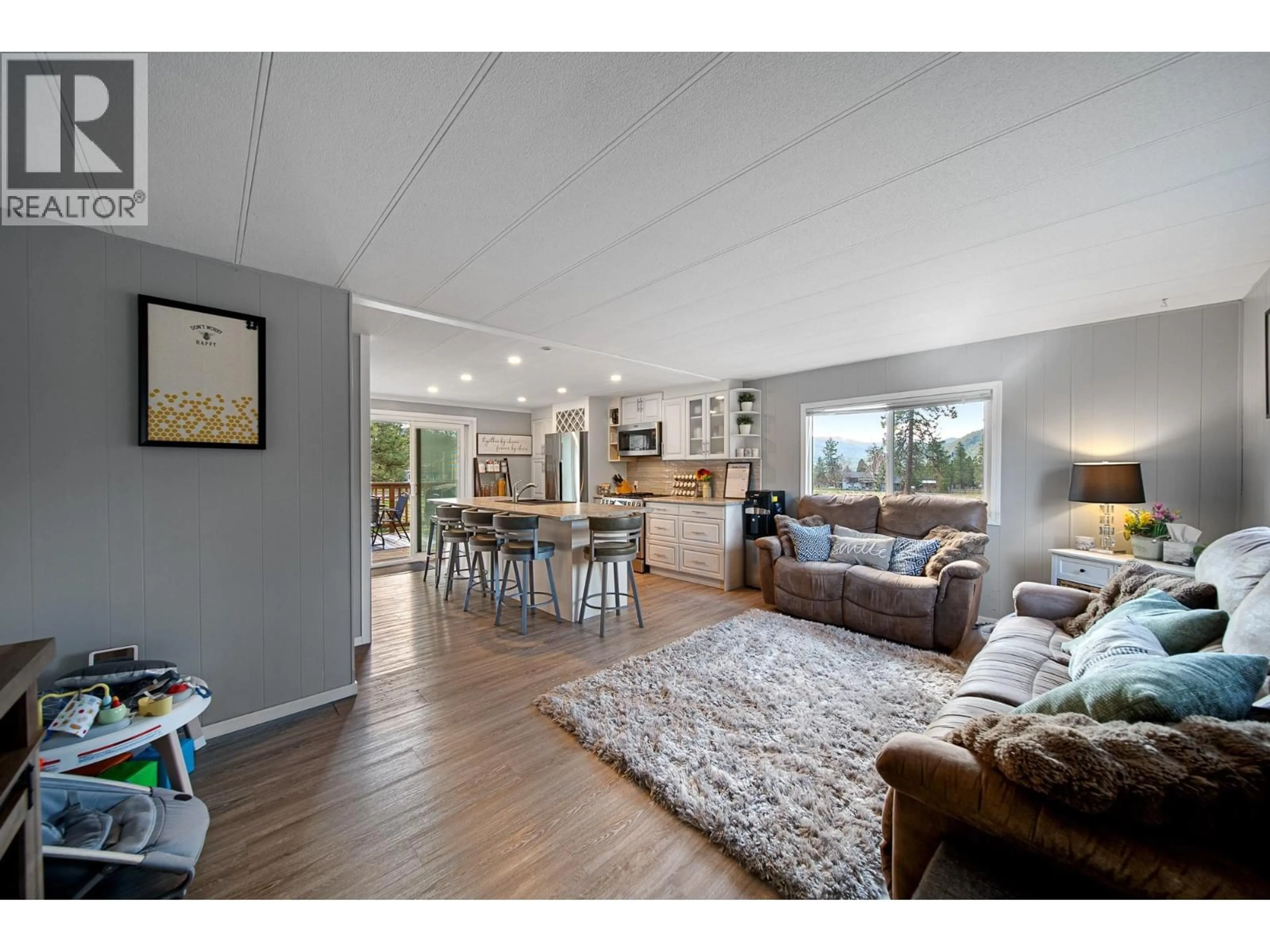 Open concept kitchen, wood/laminate floor for 2505 KINVIG STREET, Merritt British Columbia V1K1Y0