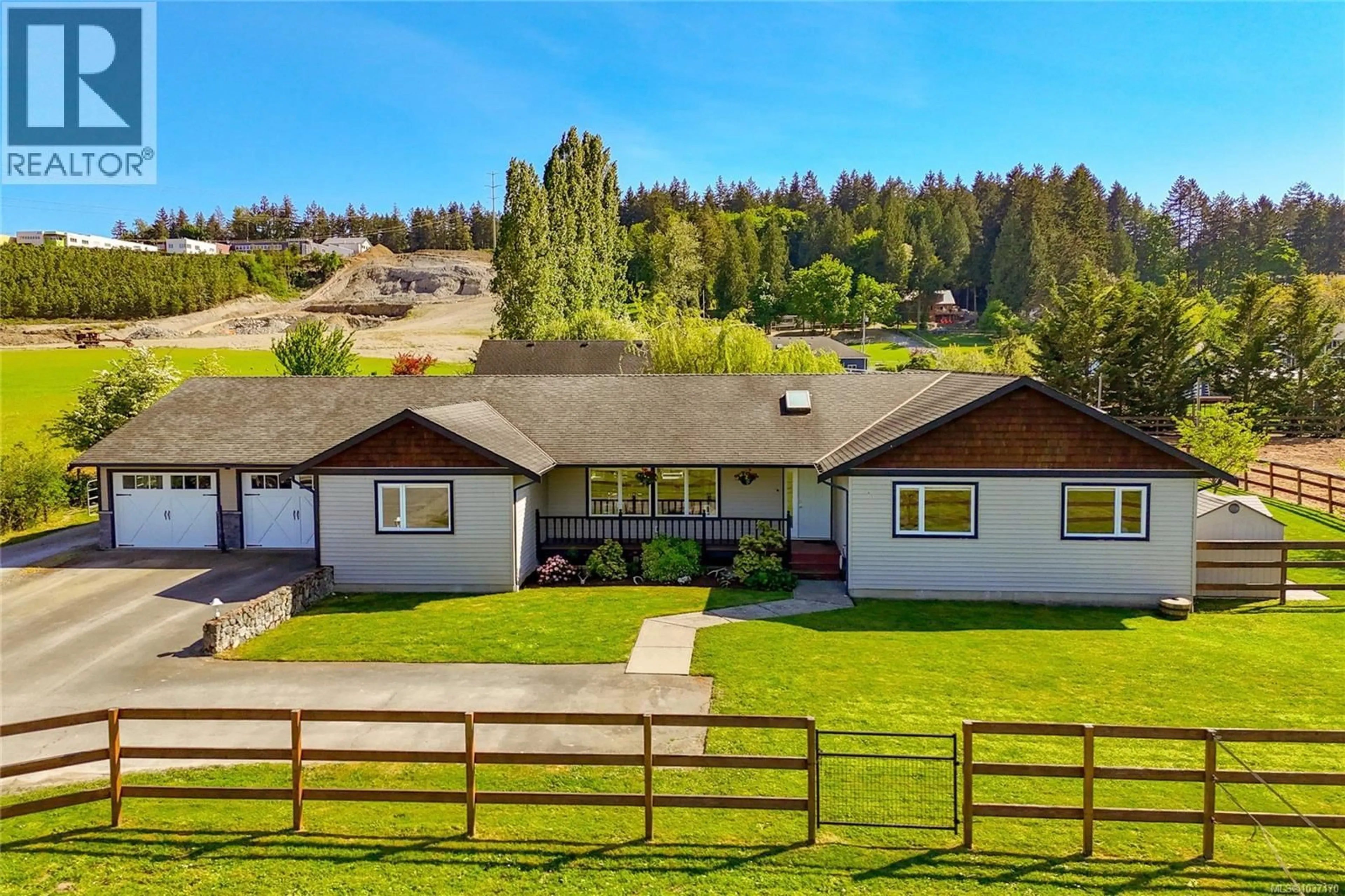 A pic from outside/outdoor area/front of a property/back of a property/a pic from drone, mountain view for 1609 KEATING CROSS ROAD, Central Saanich British Columbia V8M1W9
