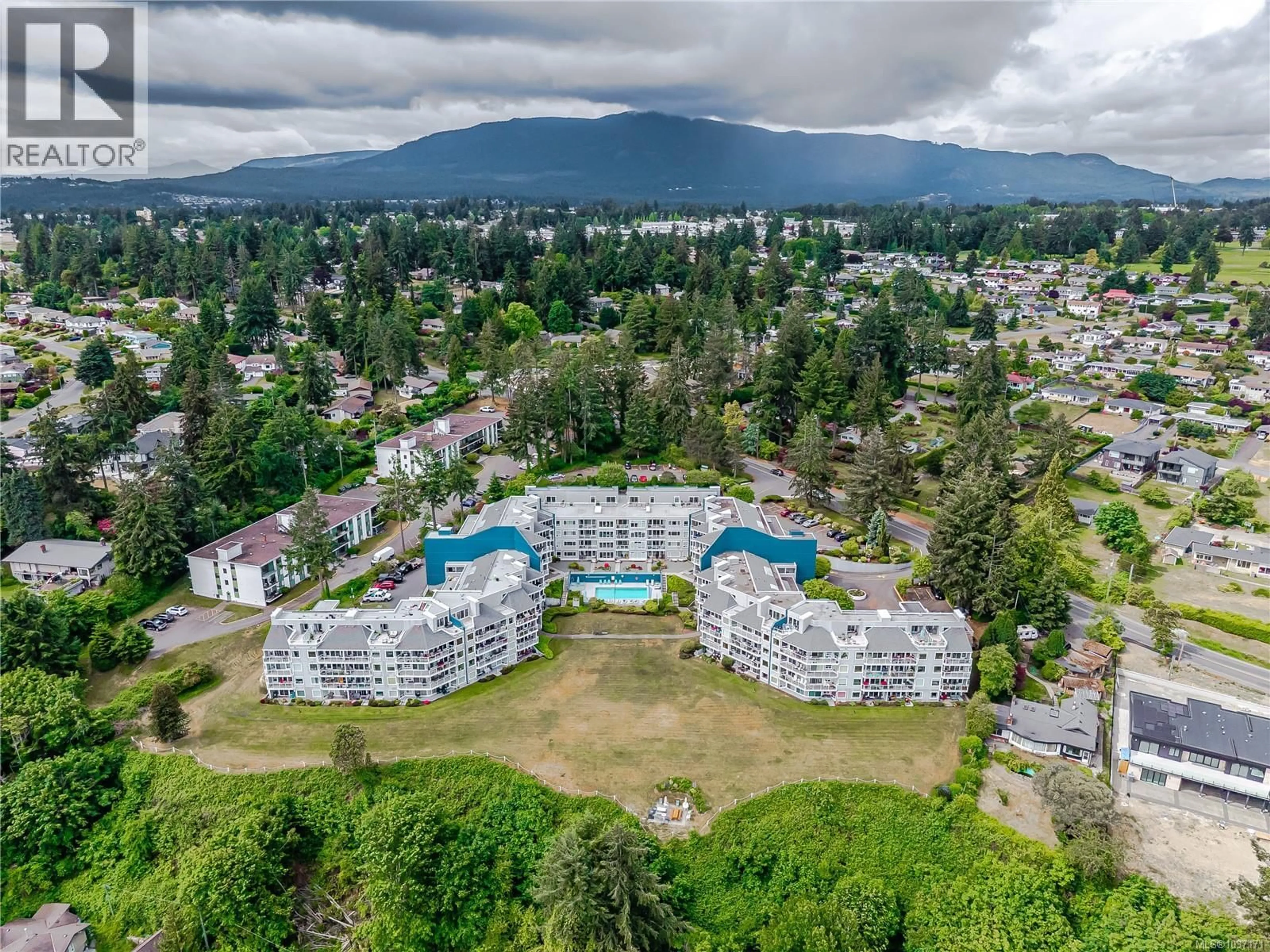 A pic from outside/outdoor area/front of a property/back of a property/a pic from drone, mountain view for 601 - 2560 DEPARTURE BAY ROAD, Nanaimo British Columbia V9S5P1