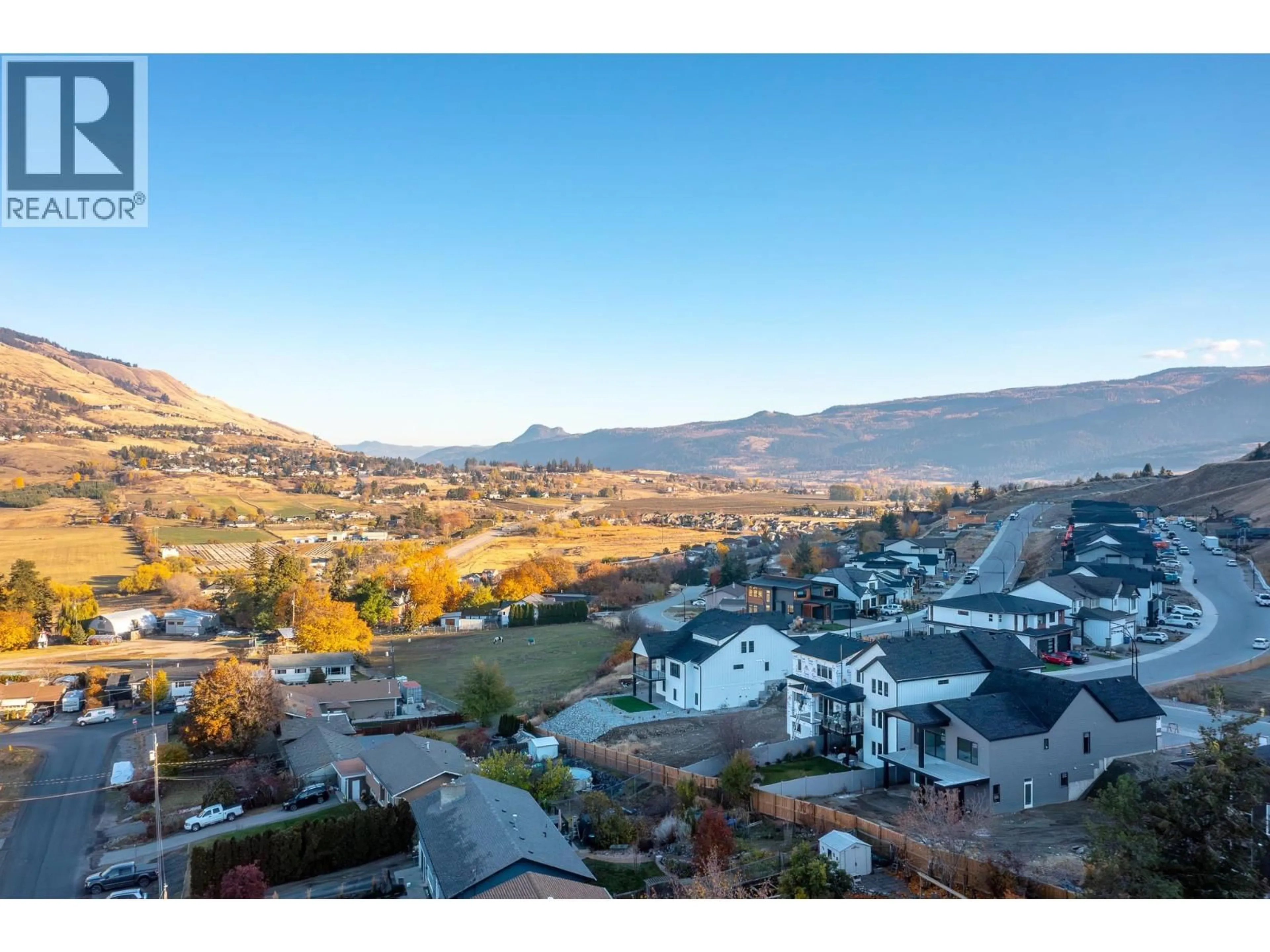 A pic from outside/outdoor area/front of a property/back of a property/a pic from drone, mountain view for 195 SARSONS DRIVE, Coldstream British Columbia V1B2H8