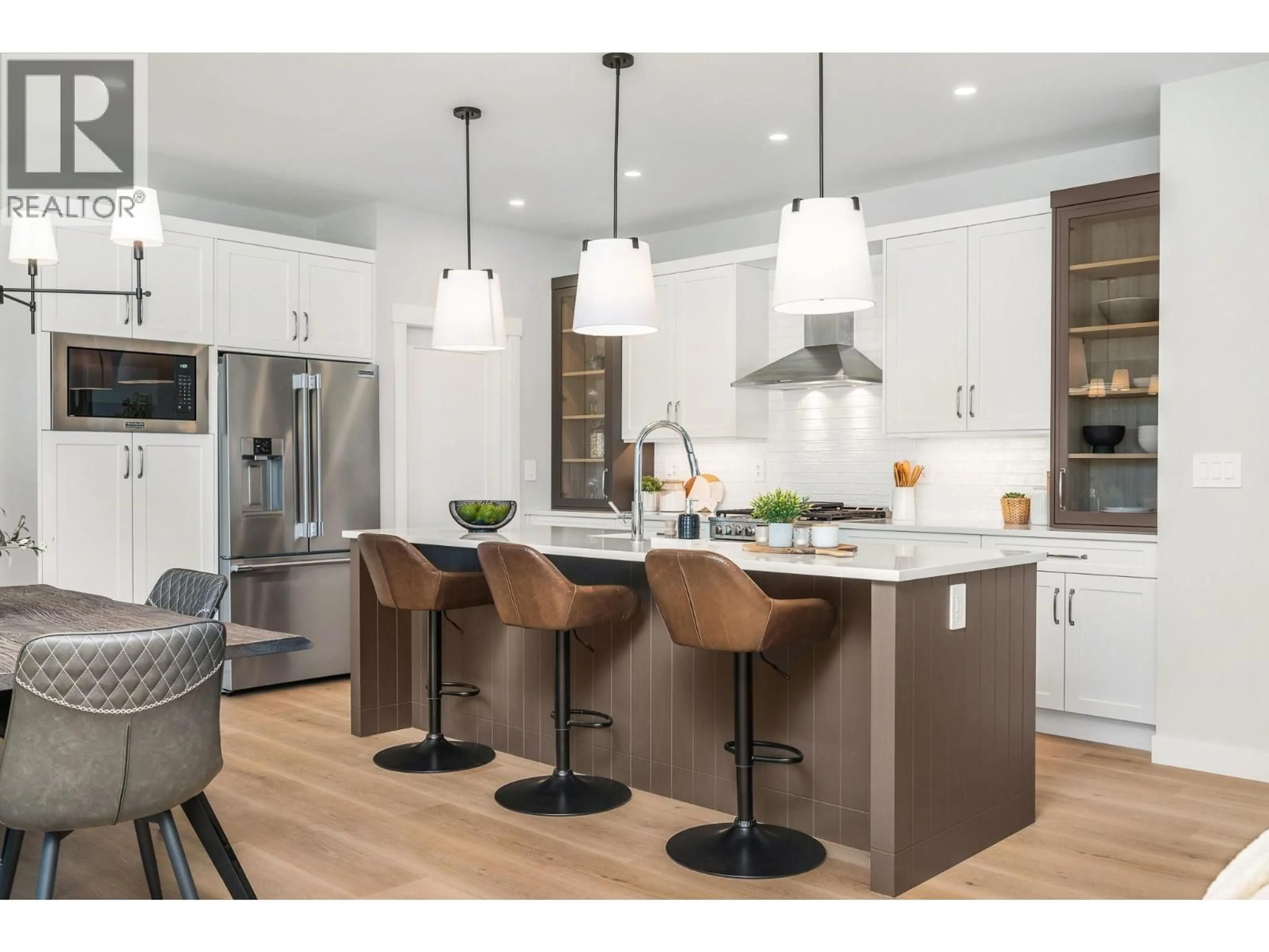 Contemporary kitchen, wood/laminate floor for 98 - 7760 OKANAGAN LANDING ROAD, Okanagan Landing British Columbia V1H1Z4