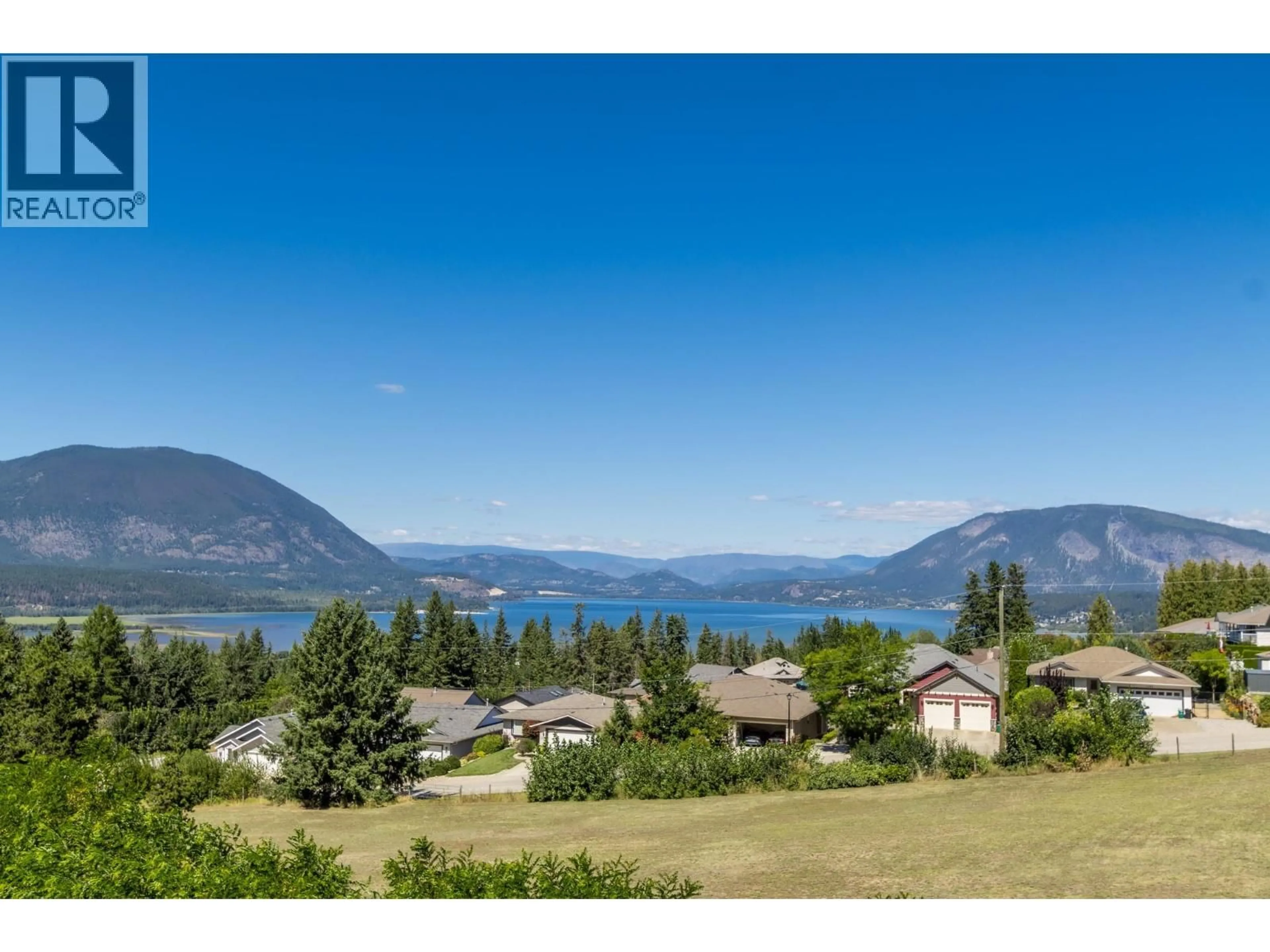 A pic from outside/outdoor area/front of a property/back of a property/a pic from drone, water/lake/river/ocean view for 1121 16 AVENUE SOUTHEAST, Salmon Arm British Columbia V1E2R5