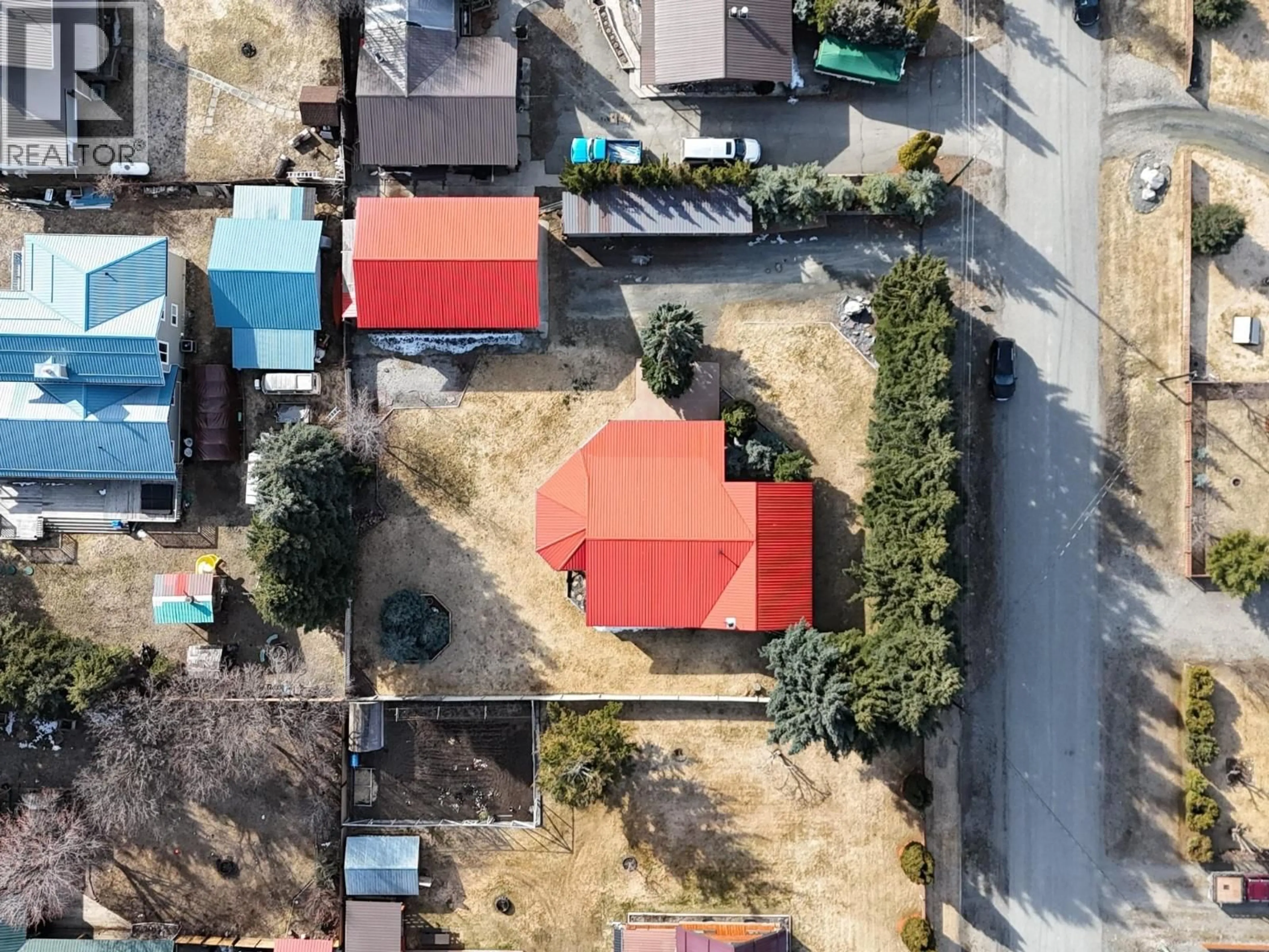 A pic from outside/outdoor area/front of a property/back of a property/a pic from drone, street for 6228 TAMARACK ROAD, Wasa British Columbia V0B2K0