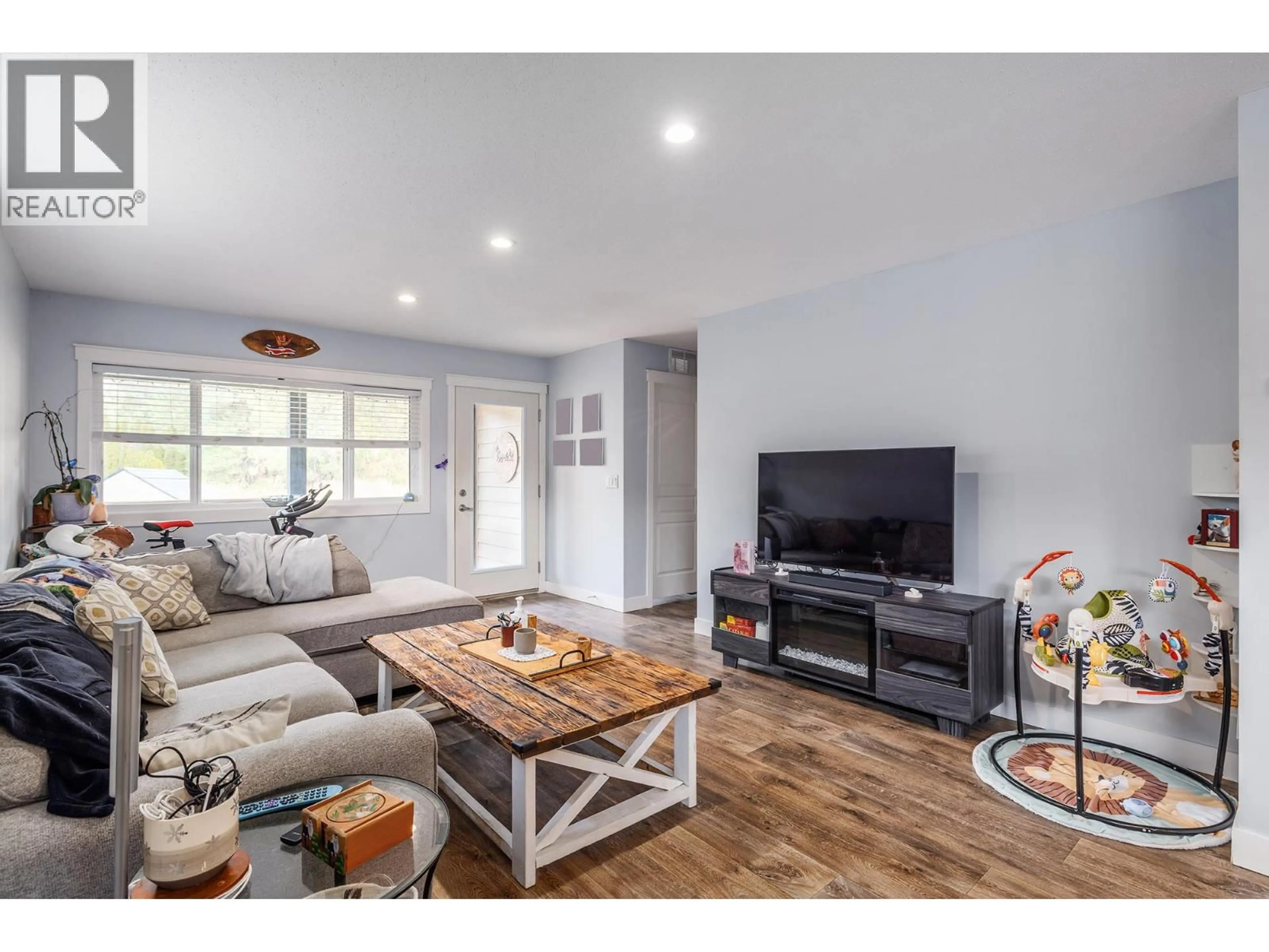 Living room with furniture, wood/laminate floor for 534 - 2440 OLD OKANAGAN HIGHWAY, Westbank British Columbia V4T3A3