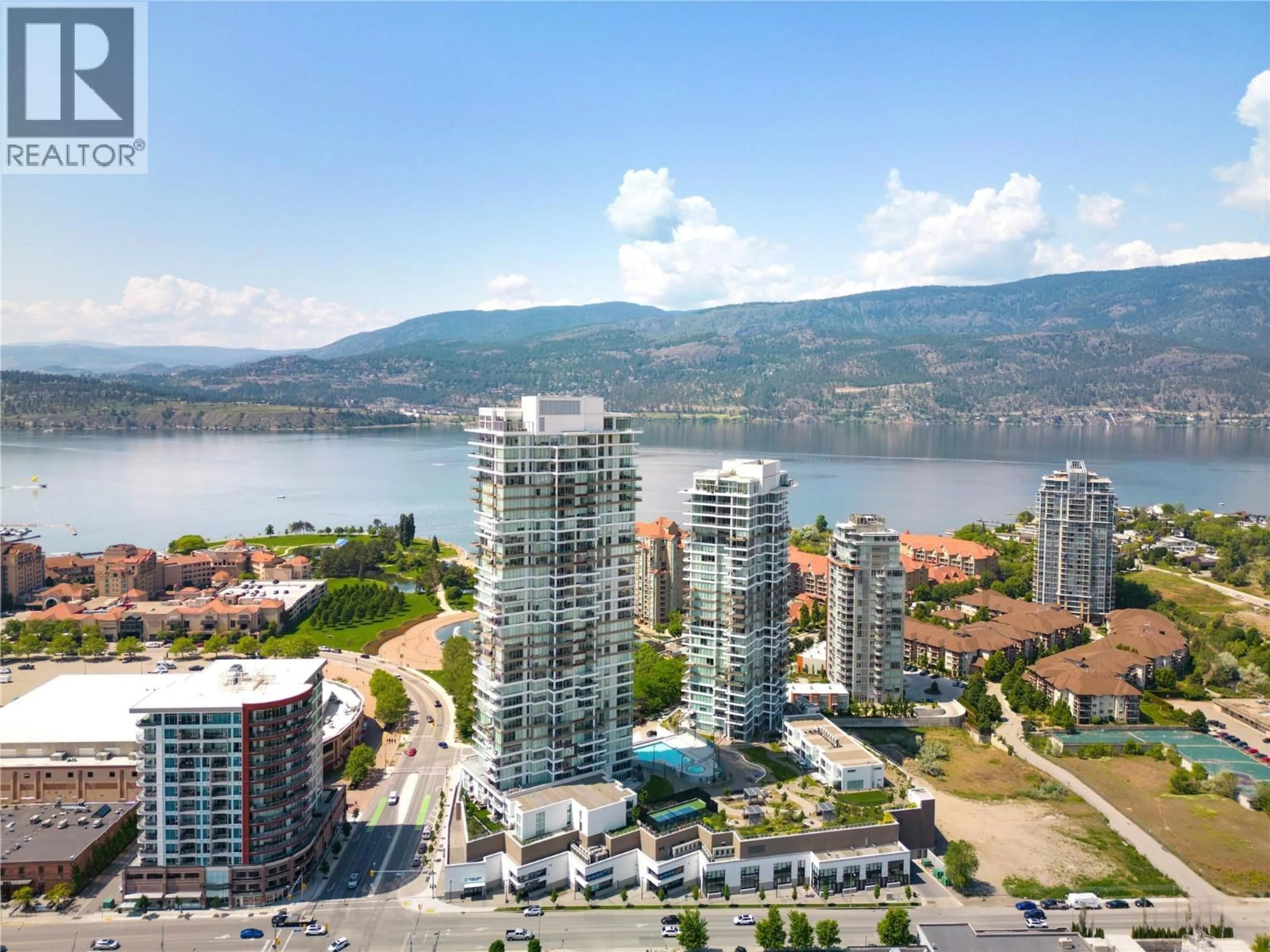 A pic from outside/outdoor area/front of a property/back of a property/a pic from drone, water/lake/river/ocean view for 601 - 1181 SUNSET DRIVE, Kelowna British Columbia V1Y0L4