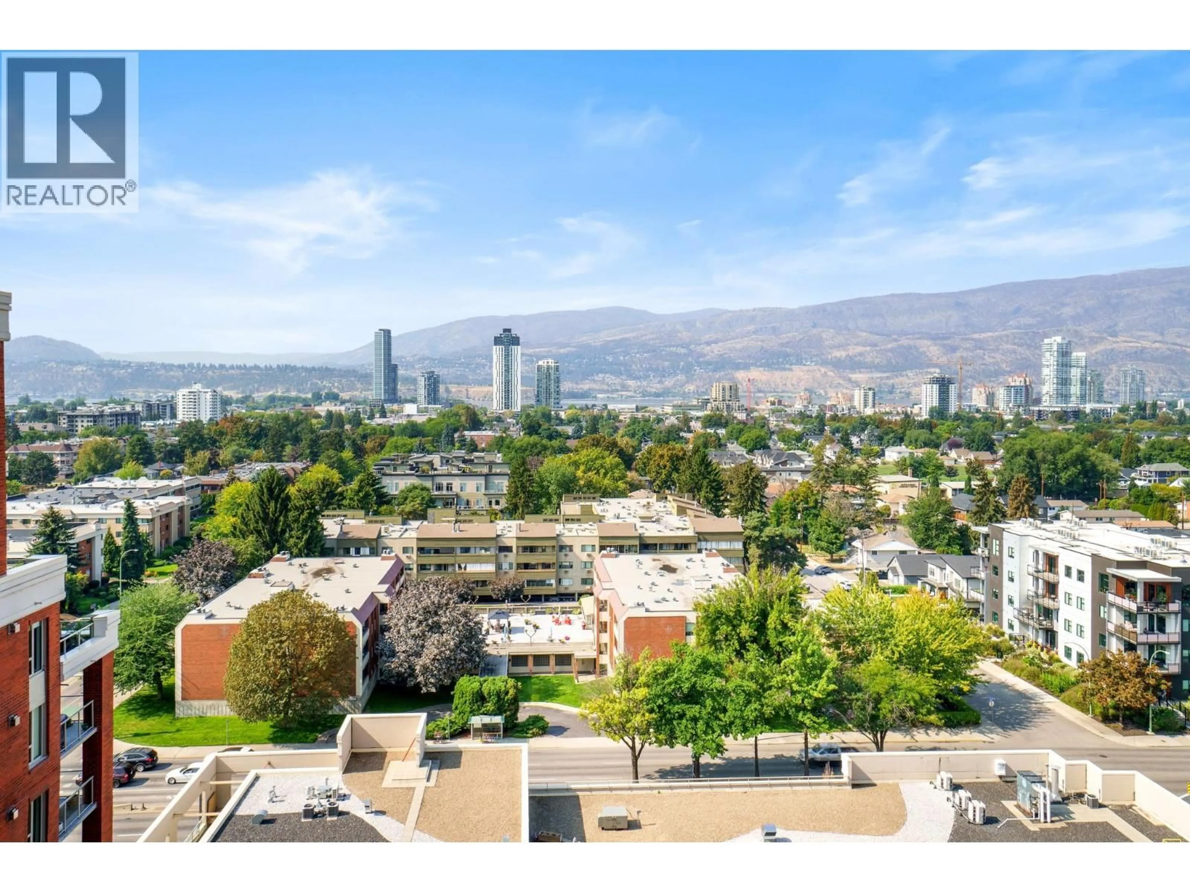 A pic from outside/outdoor area/front of a property/back of a property/a pic from drone, mountain view for 1203 - 1160 BERNARD AVENUE, Kelowna British Columbia V1Y6R2