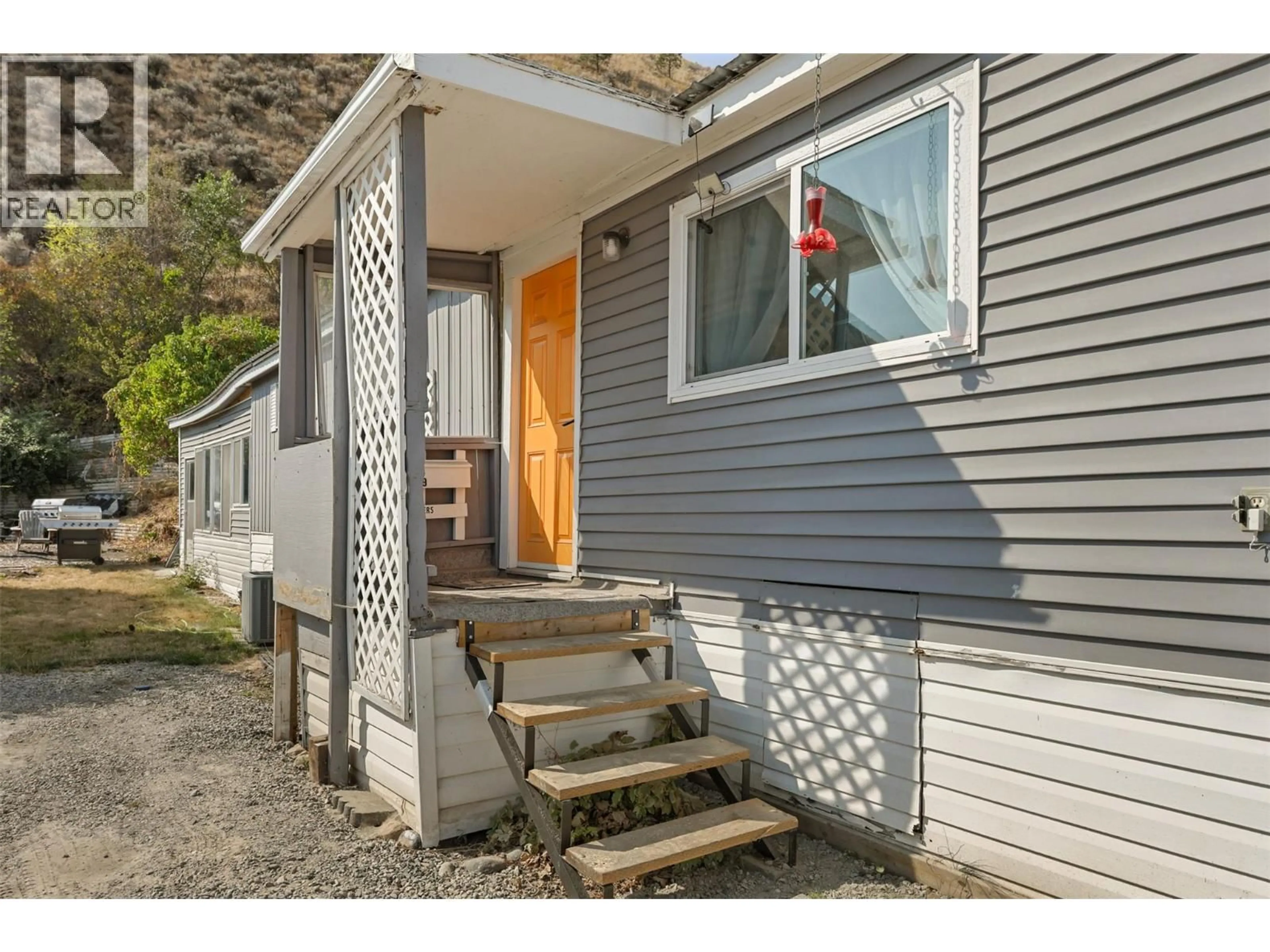 Home with vinyl exterior material, street for E9 - 7155 DALLAS DRIVE, Kamloops British Columbia V2C4T1