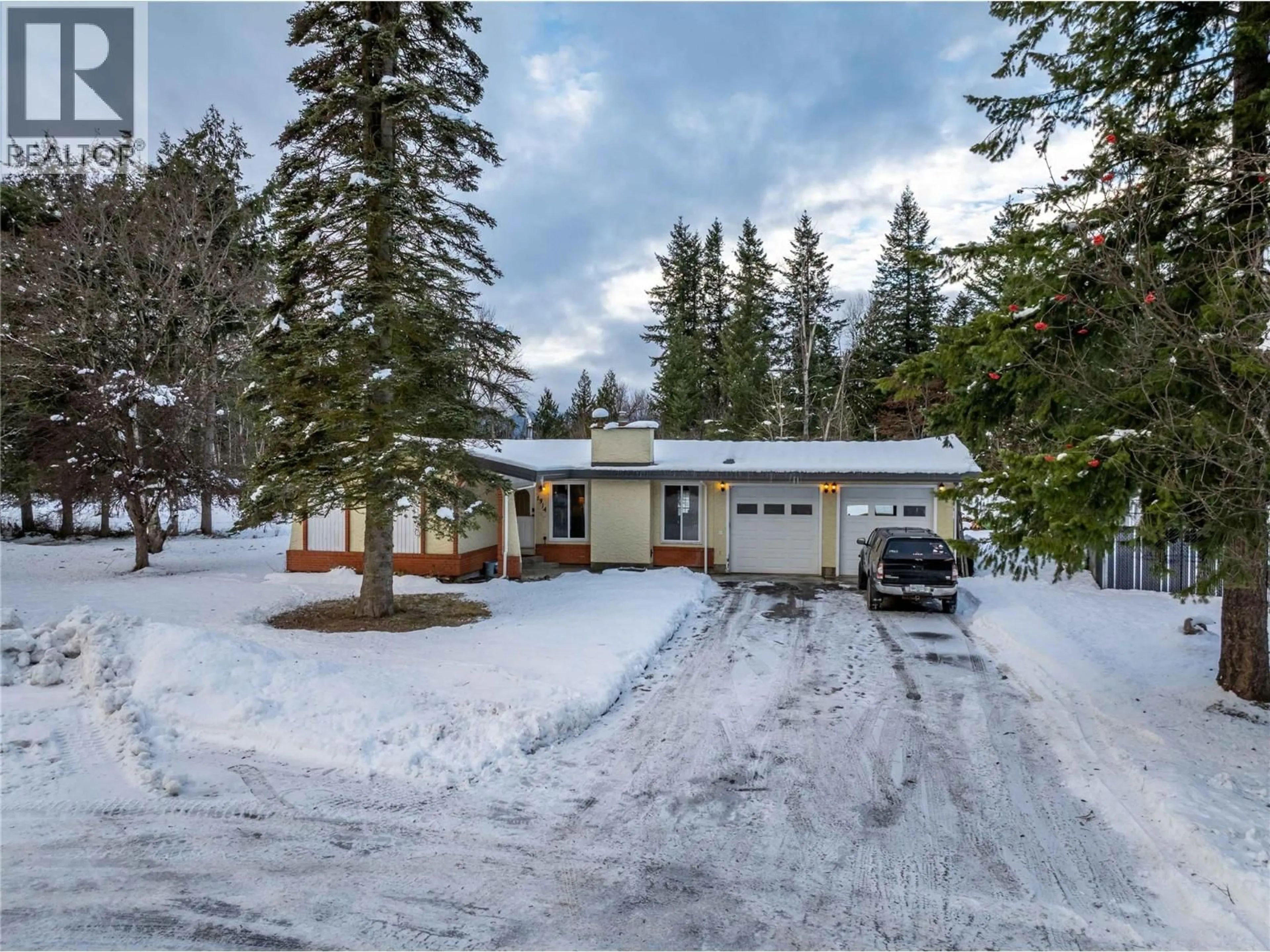 A pic from outside/outdoor area/front of a property/back of a property/a pic from drone, street for 1314 PRATICO ROAD, Revelstoke British Columbia V0E2S1