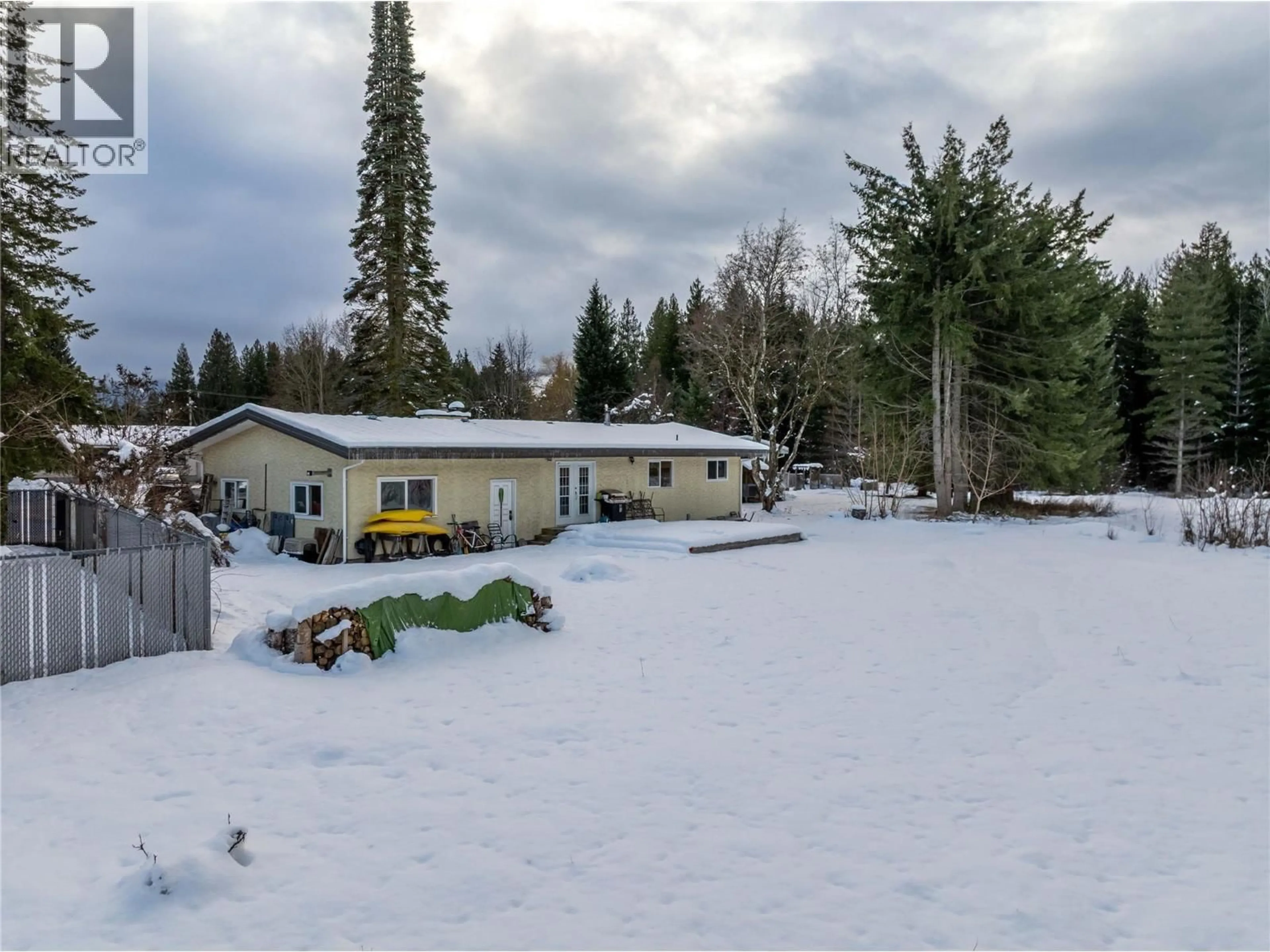 A pic from outside/outdoor area/front of a property/back of a property/a pic from drone, mountain view for 1314 PRATICO ROAD, Revelstoke British Columbia V0E2S1