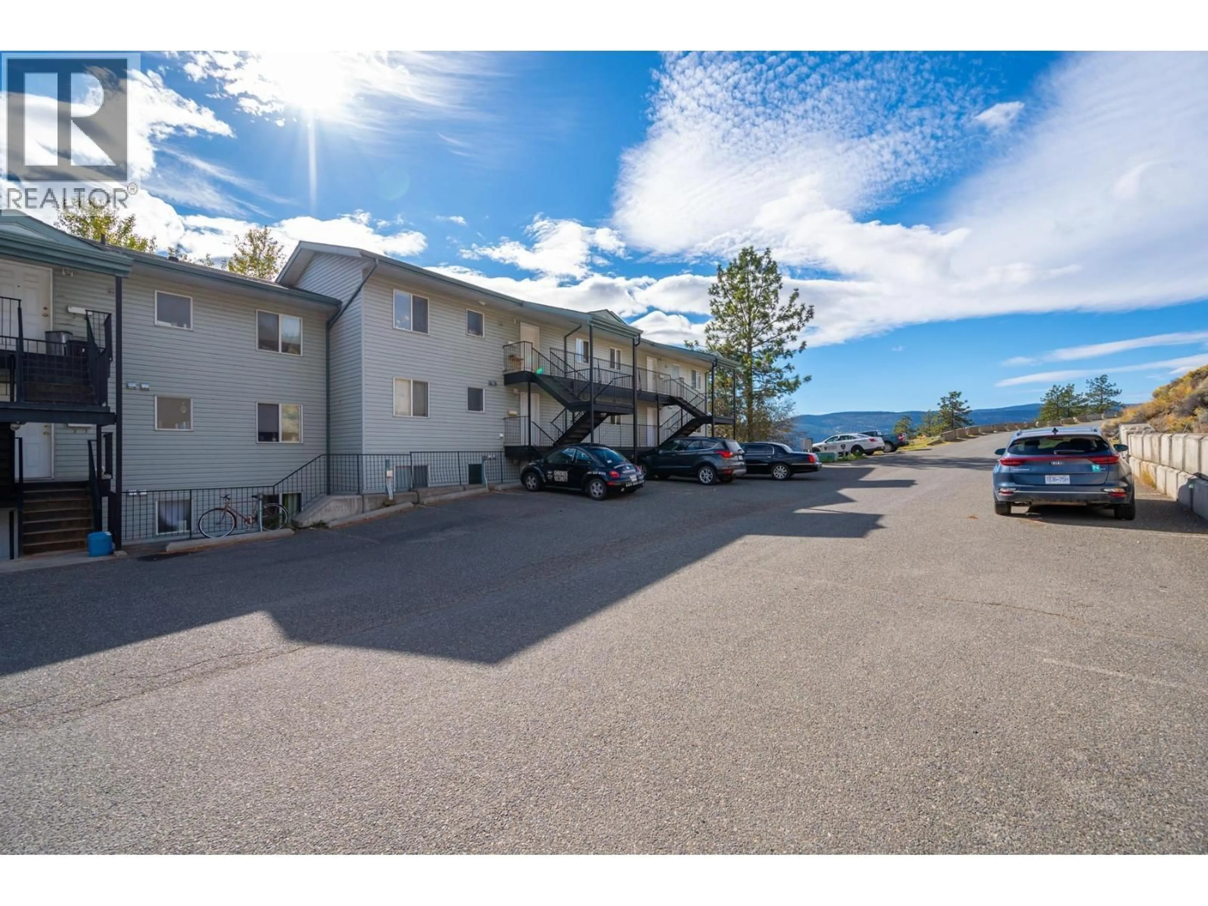 A pic from outside/outdoor area/front of a property/back of a property/a pic from drone, mountain view for 301 - 2802 GRANDVIEW HEIGHTS, Merritt British Columbia V1K1P9