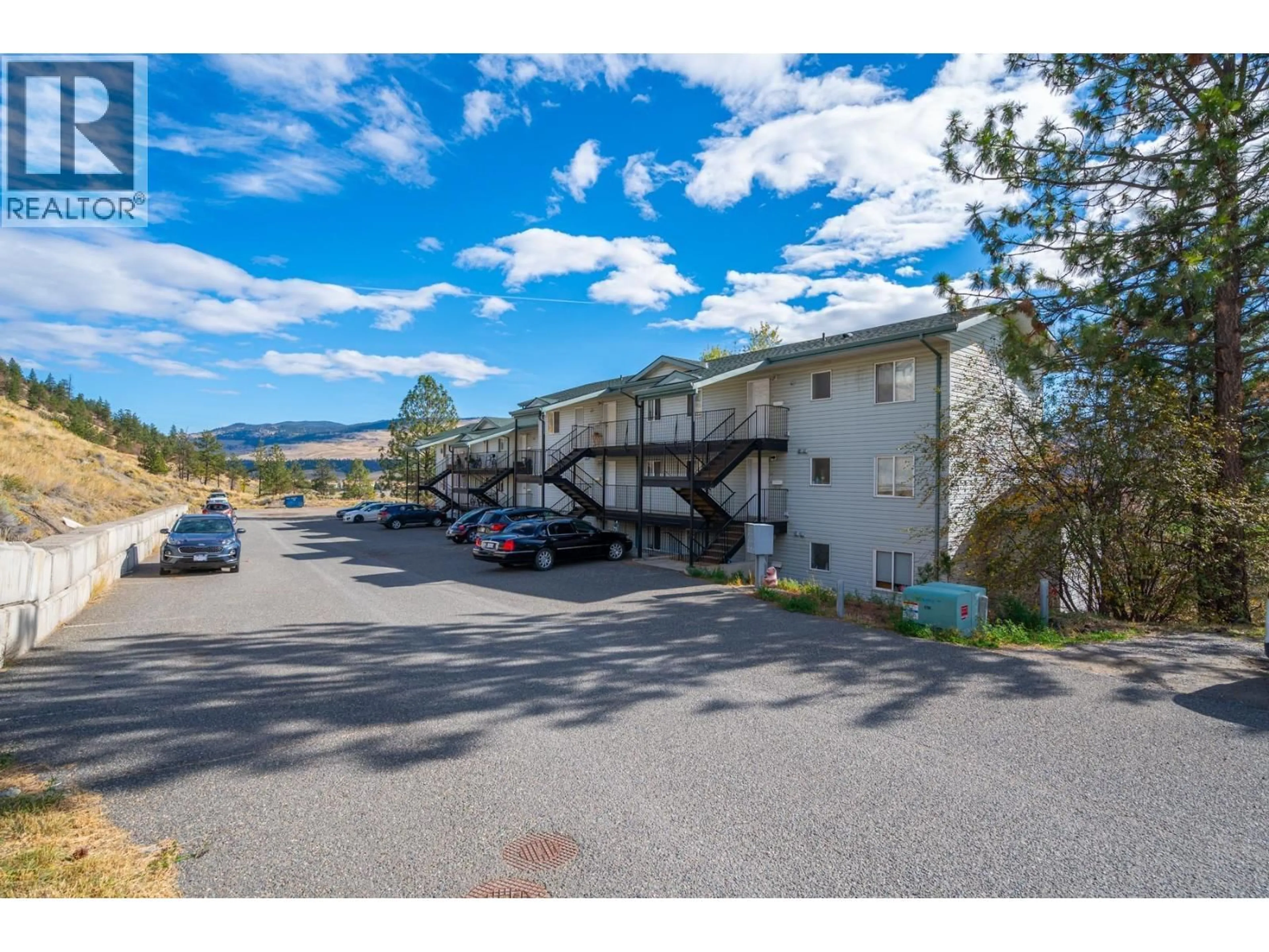 A pic from outside/outdoor area/front of a property/back of a property/a pic from drone, mountain view for 301 - 2802 GRANDVIEW HEIGHTS, Merritt British Columbia V1K1P9