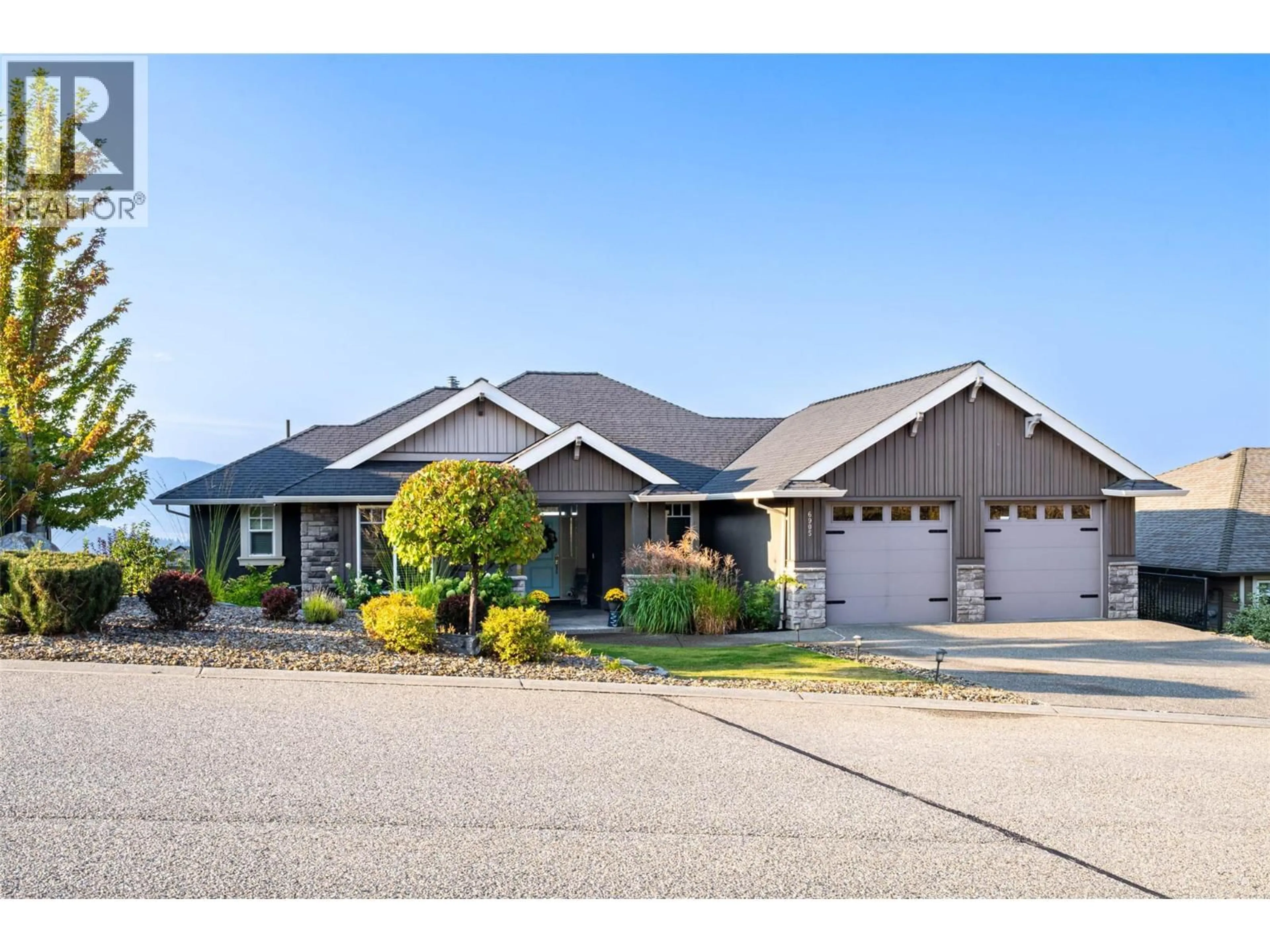 Home with vinyl exterior material, street for 6905 FOOTHILLS DRIVE, Vernon British Columbia V1B4B1