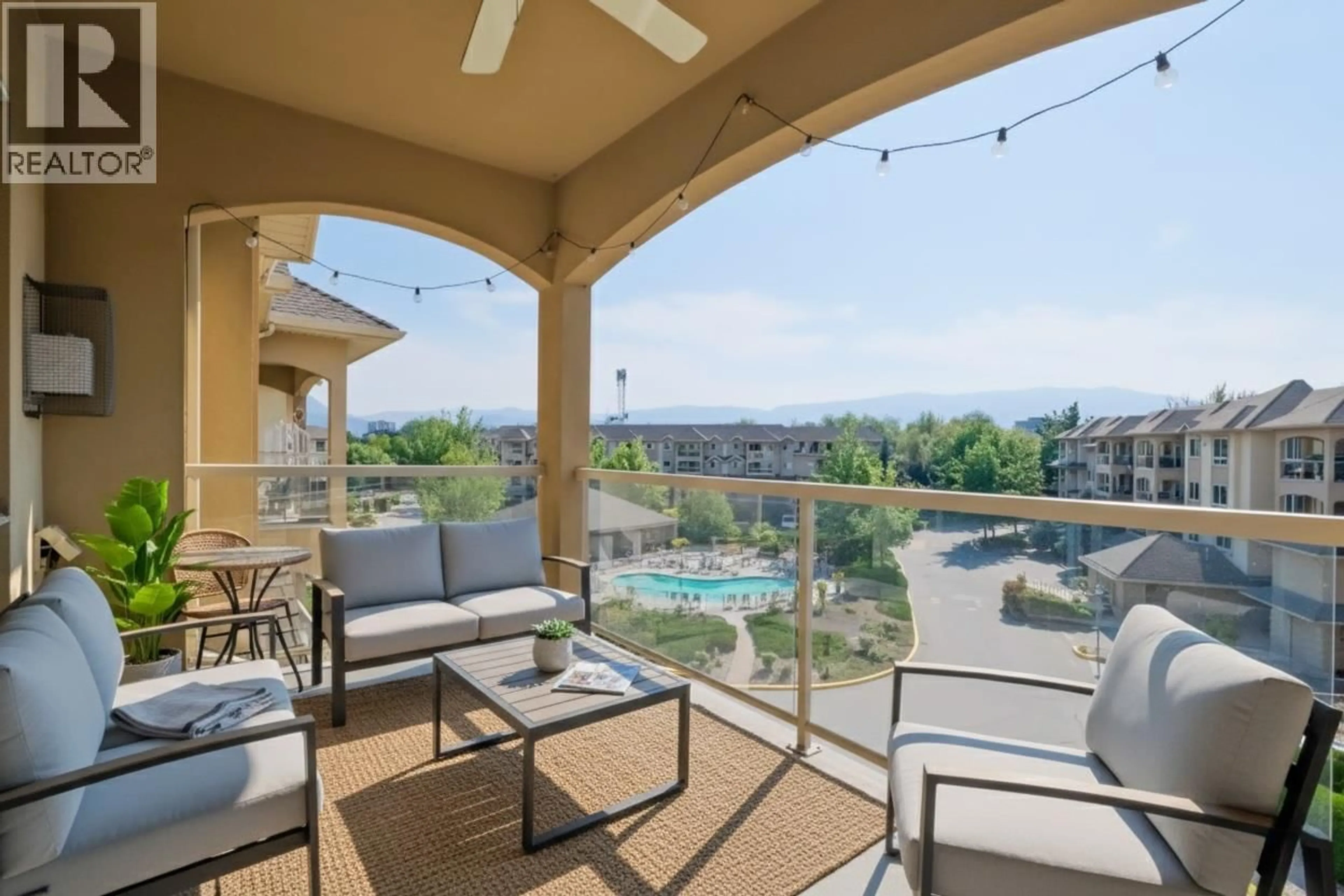 Patio, water/lake/river/ocean view for 411 - 1962 ENTERPRISE WAY, Kelowna British Columbia V1Y9S6