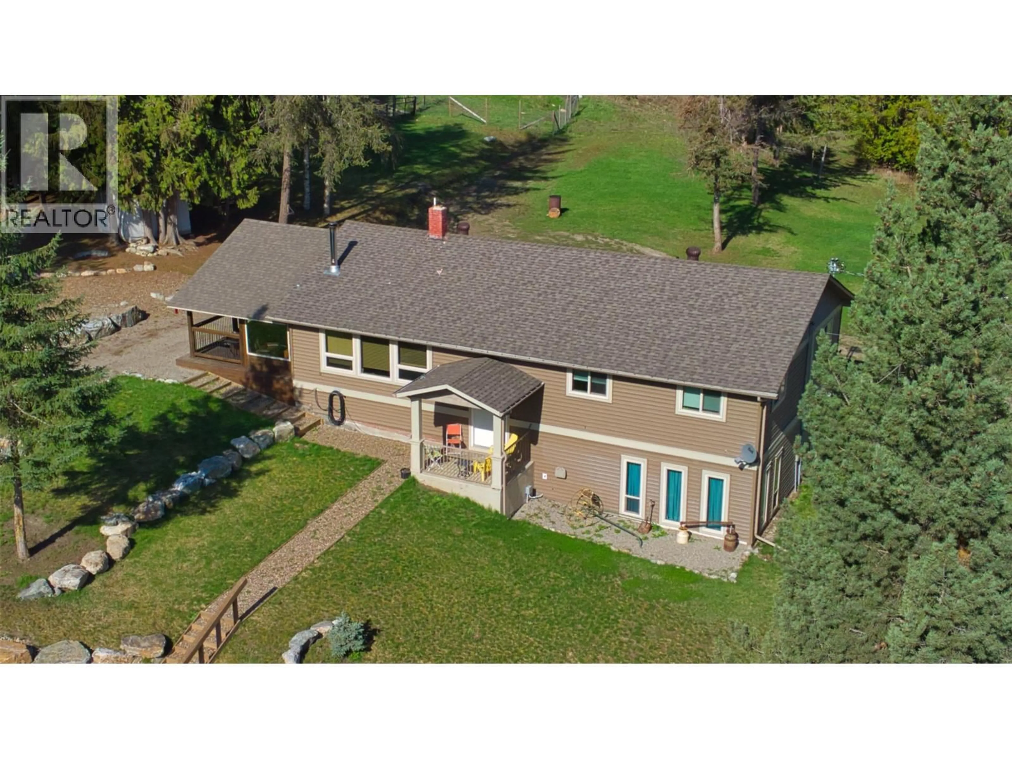A pic from outside/outdoor area/front of a property/back of a property/a pic from drone, building for 348 CREIGHTON VALLEY ROAD, Lumby British Columbia V0E2G1