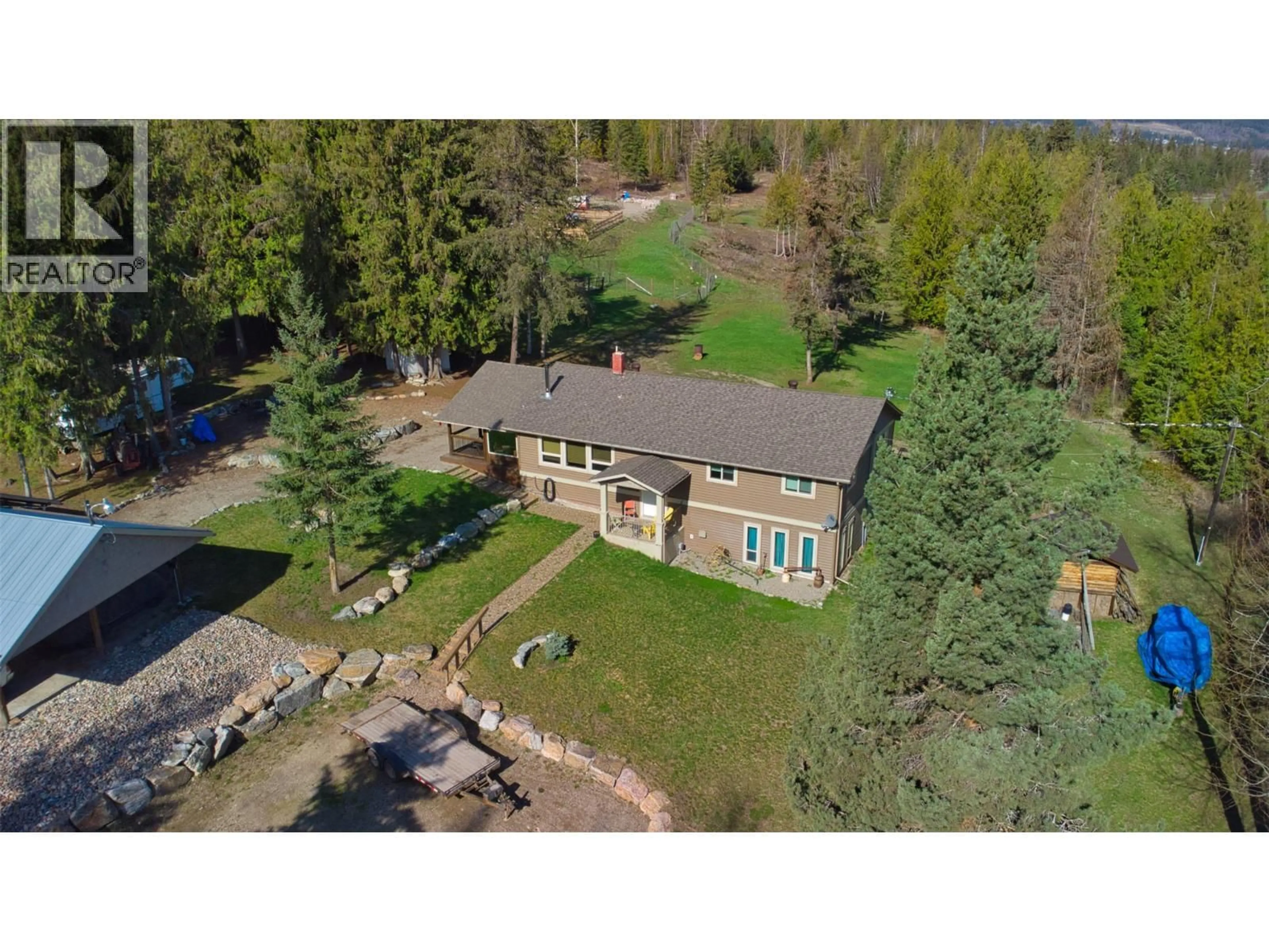 A pic from outside/outdoor area/front of a property/back of a property/a pic from drone, unknown for 348 CREIGHTON VALLEY ROAD, Lumby British Columbia V0E2G1