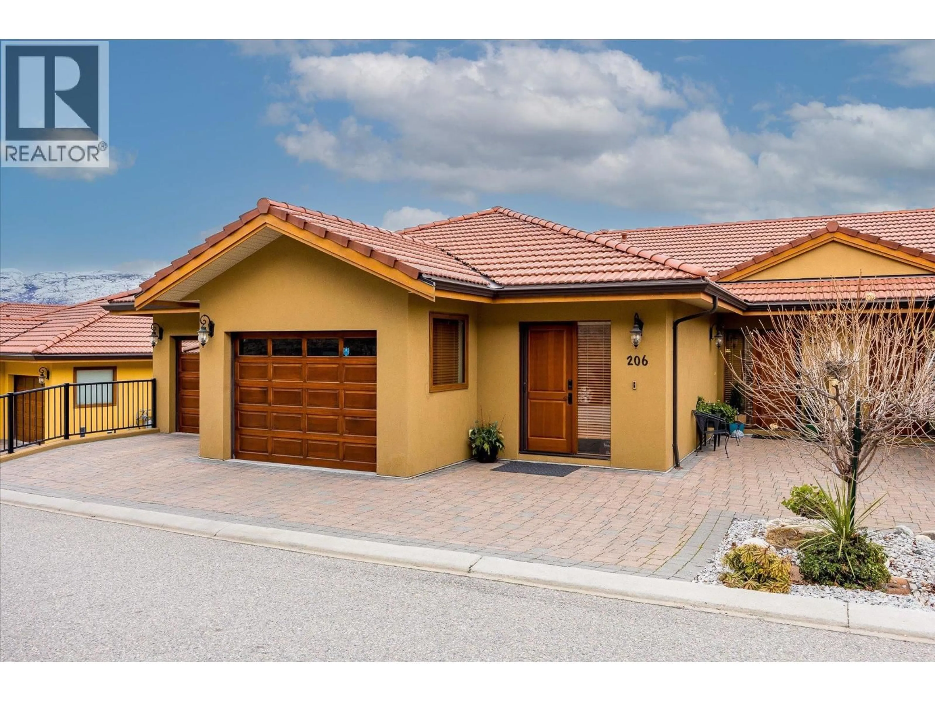 Home with brick exterior material, street for 206 - 14419 DOWNTON AVENUE, Summerland British Columbia V0H1Z1