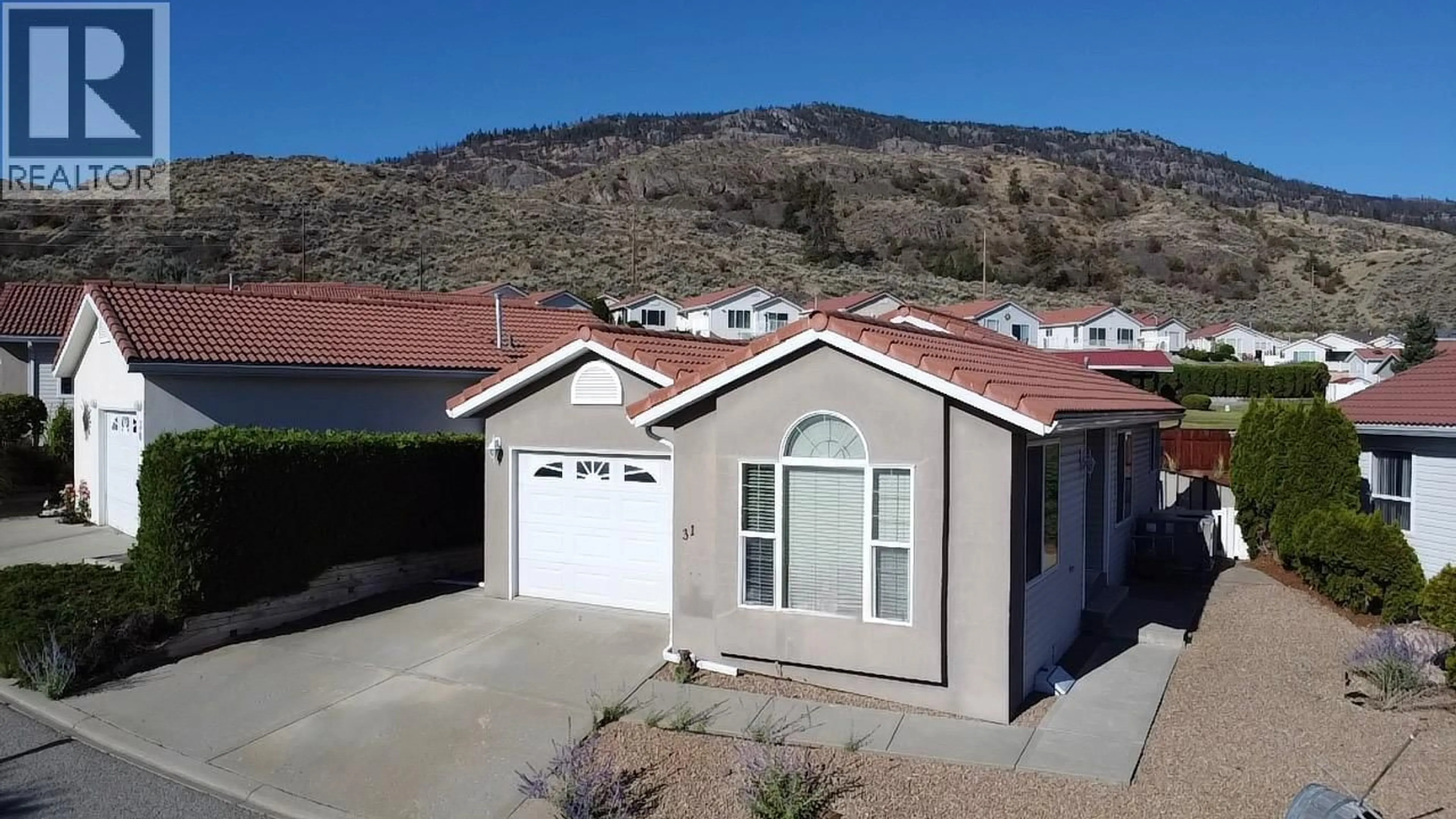 Home with vinyl exterior material, street for 31 - 9400 115TH STREET, Osoyoos British Columbia V0H1V5