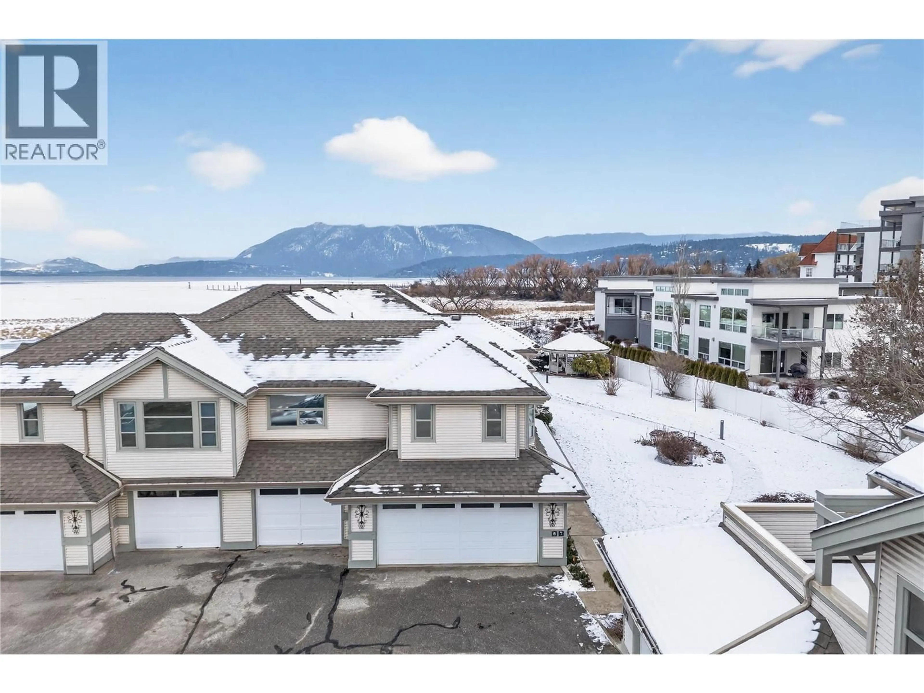 A pic from outside/outdoor area/front of a property/back of a property/a pic from drone, mountain view for 8 - 111 HARBOURFRONT DRIVE NORTHWEST, Salmon Arm British Columbia V1E1A3