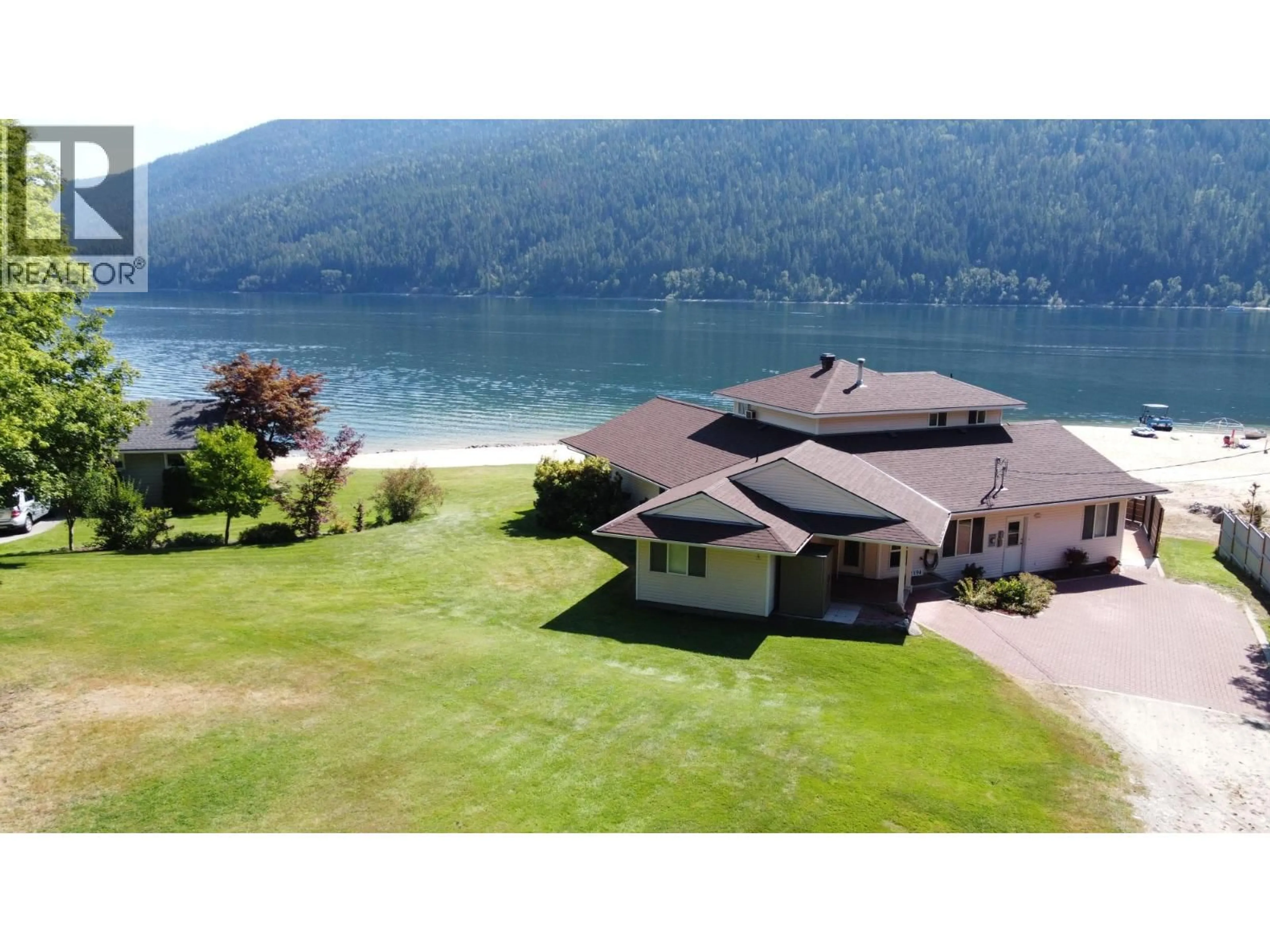A pic from outside/outdoor area/front of a property/back of a property/a pic from drone, water/lake/river/ocean view for 2194 3A HIGHWAY, Nelson British Columbia V1L6K5