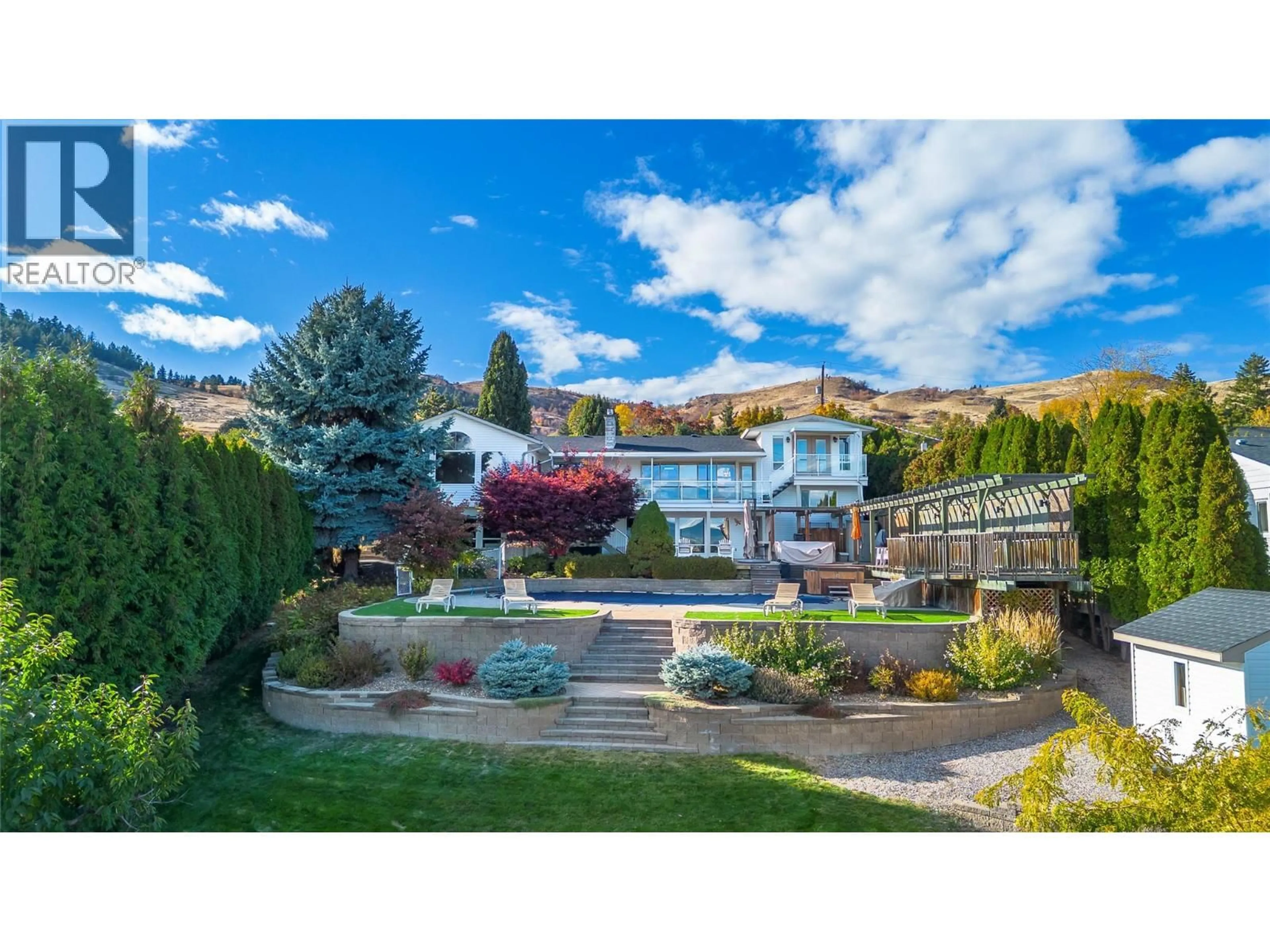 A pic from outside/outdoor area/front of a property/back of a property/a pic from drone, mountain view for 13709 NASH DRIVE, Coldstream British Columbia V1B1X9