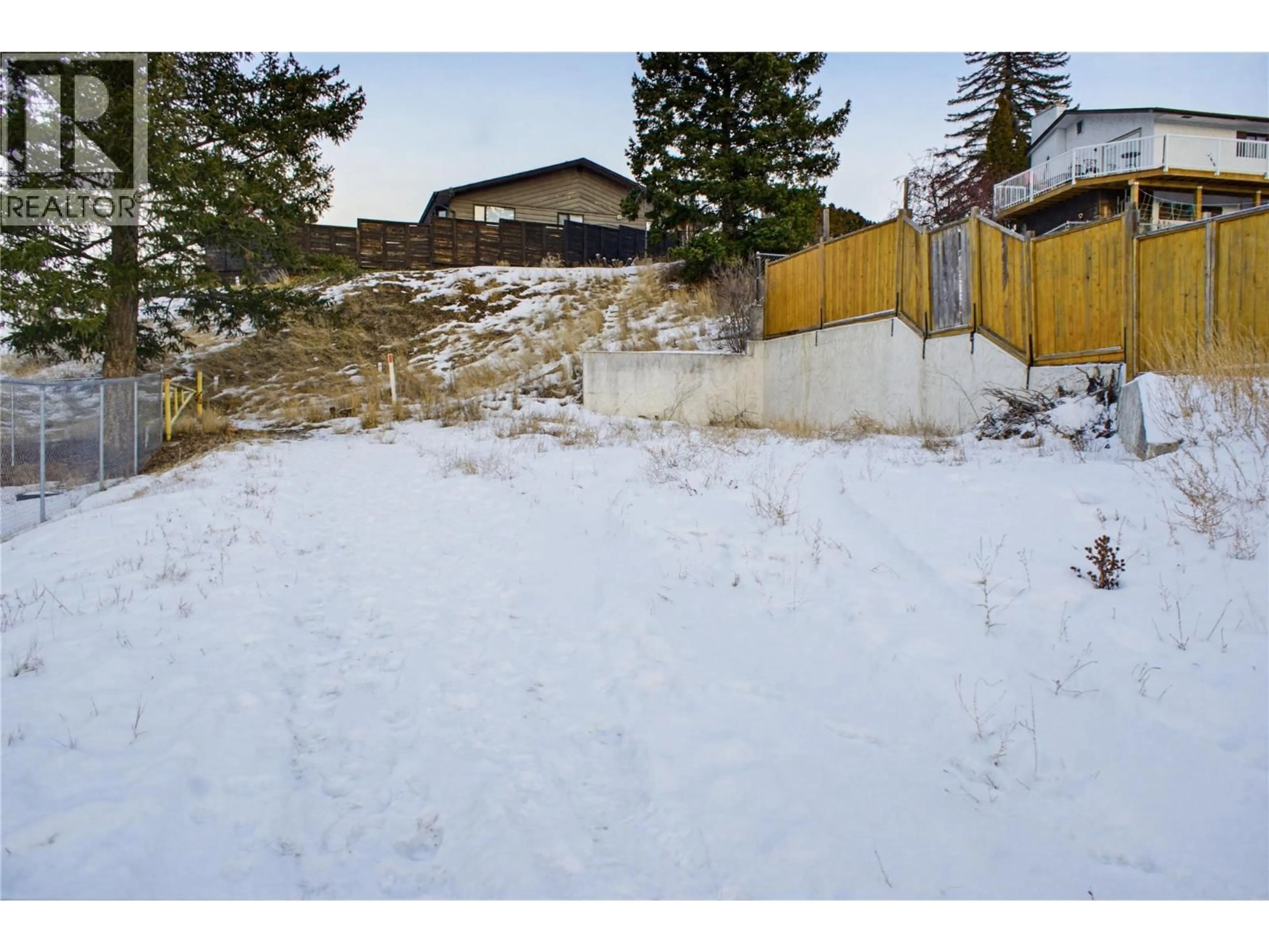 A pic from outside/outdoor area/front of a property/back of a property/a pic from drone, mountain view for 748 GLENEAGLES DRIVE, Kamloops British Columbia V2E1J8