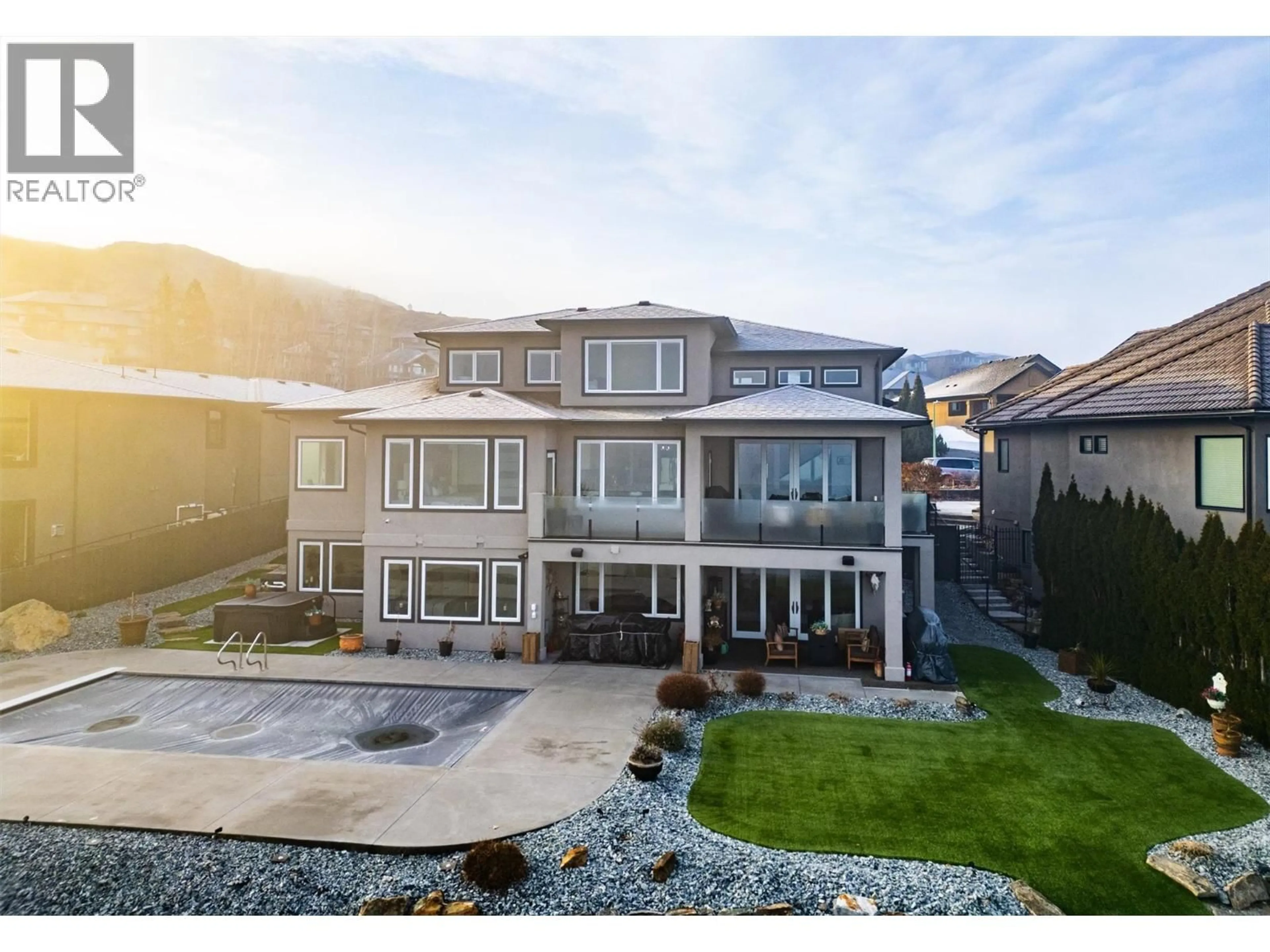 A pic from outside/outdoor area/front of a property/back of a property/a pic from drone, mountain view for 750 KUIPERS CRESCENT, Kelowna British Columbia V1W5H4