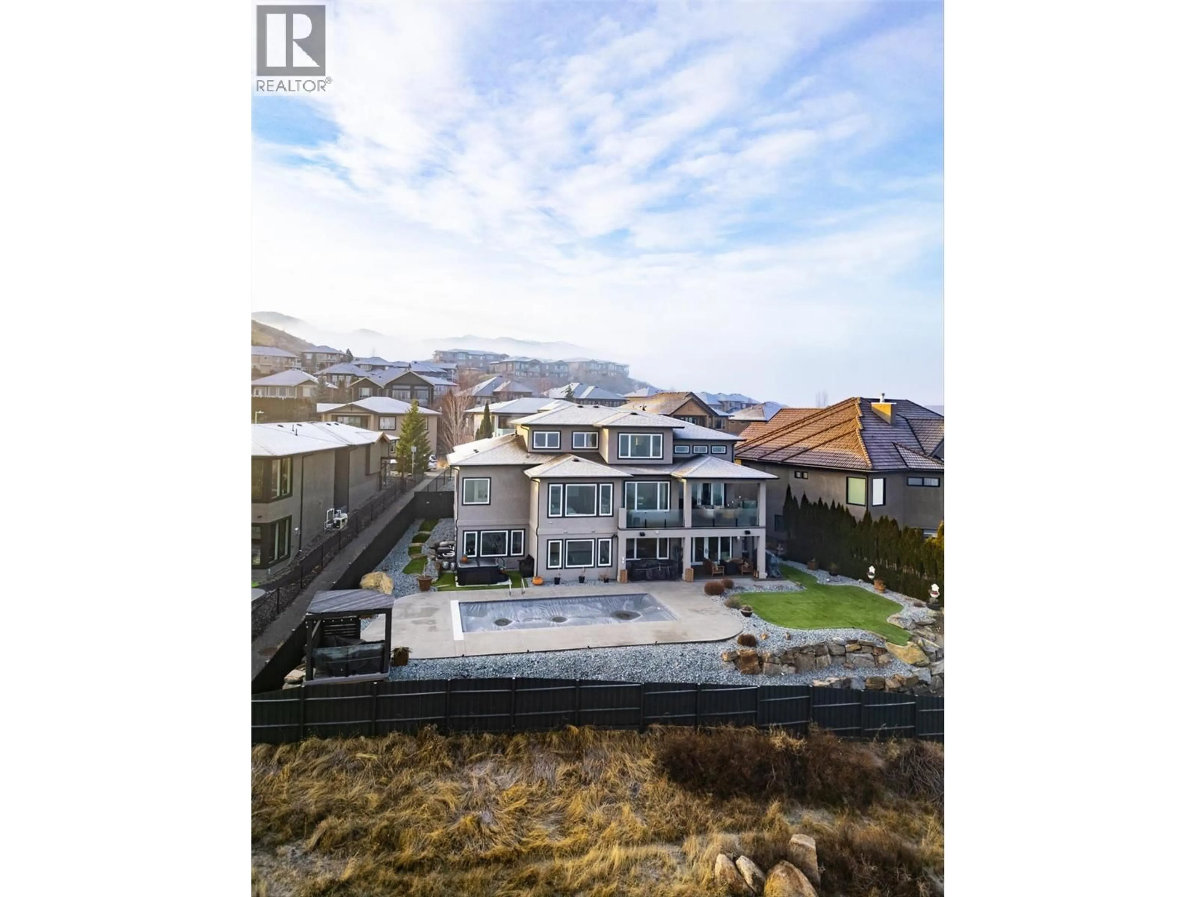 A pic from outside/outdoor area/front of a property/back of a property/a pic from drone, water/lake/river/ocean view for 750 KUIPERS CRESCENT, Kelowna British Columbia V1W5H4