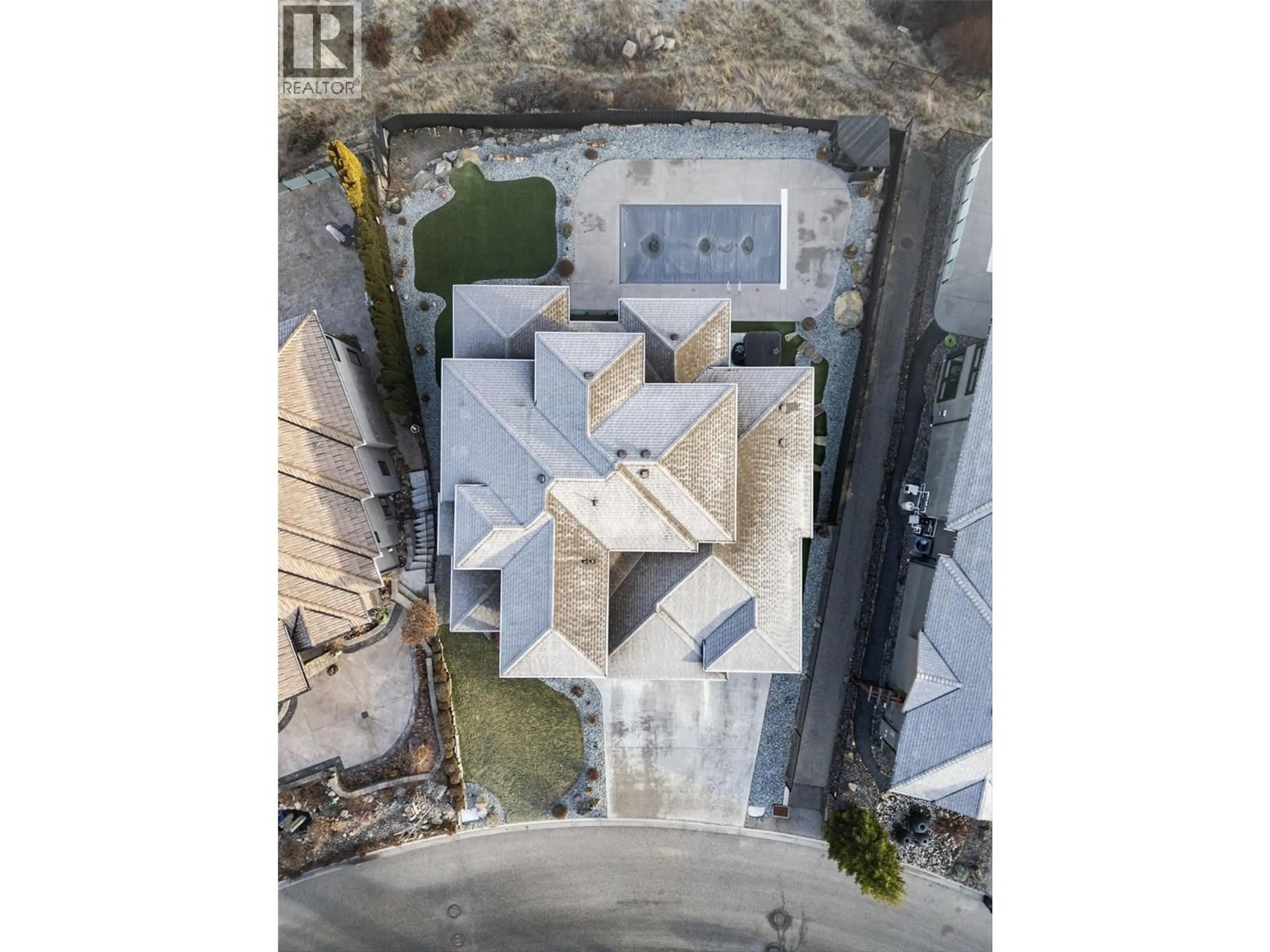 A pic from outside/outdoor area/front of a property/back of a property/a pic from drone, street for 750 KUIPERS CRESCENT, Kelowna British Columbia V1W5H4