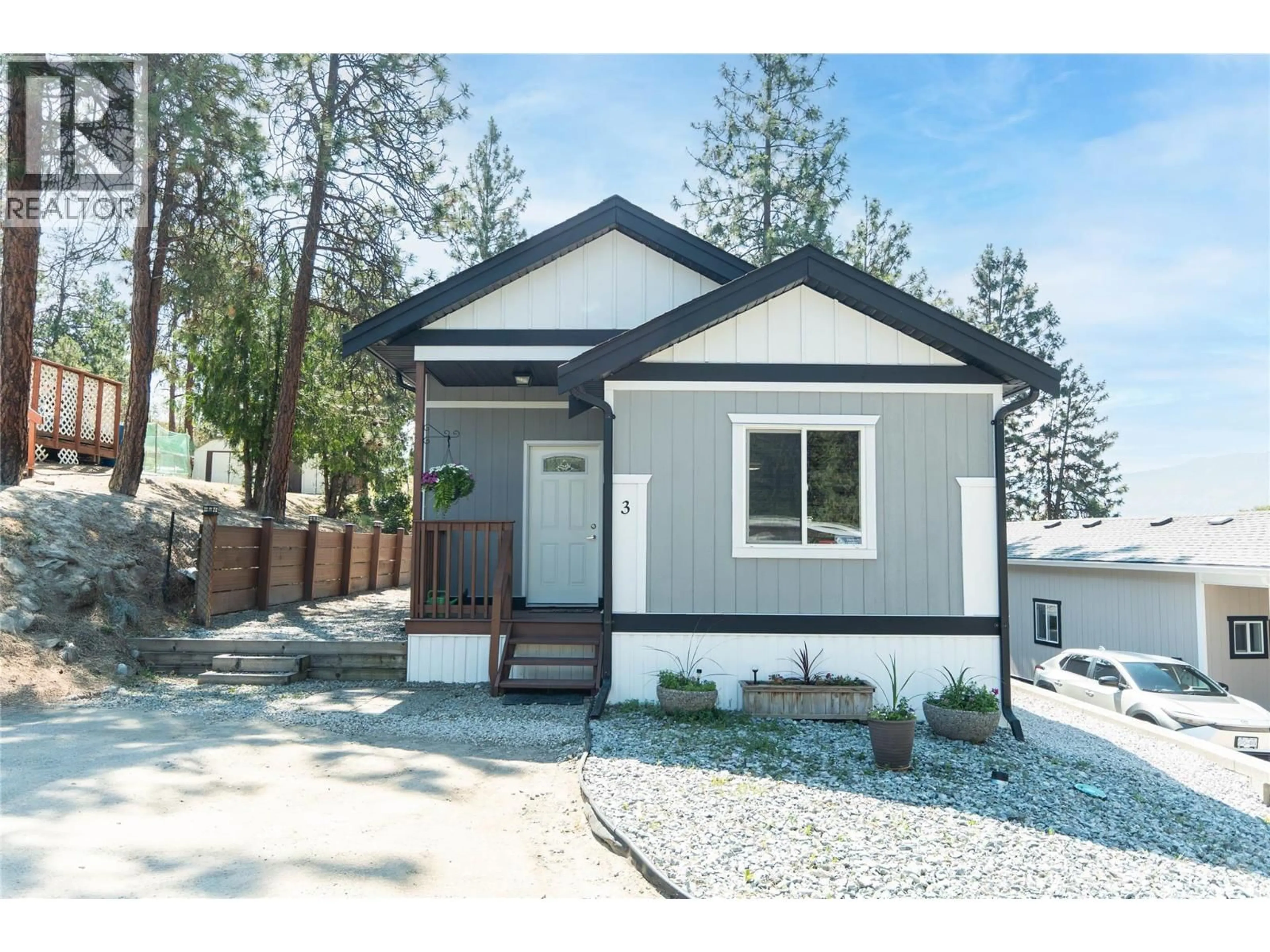 Home with vinyl exterior material, street for 3 - 1860 BOUCHERIE ROAD, West Kelowna British Columbia V4T1Z9