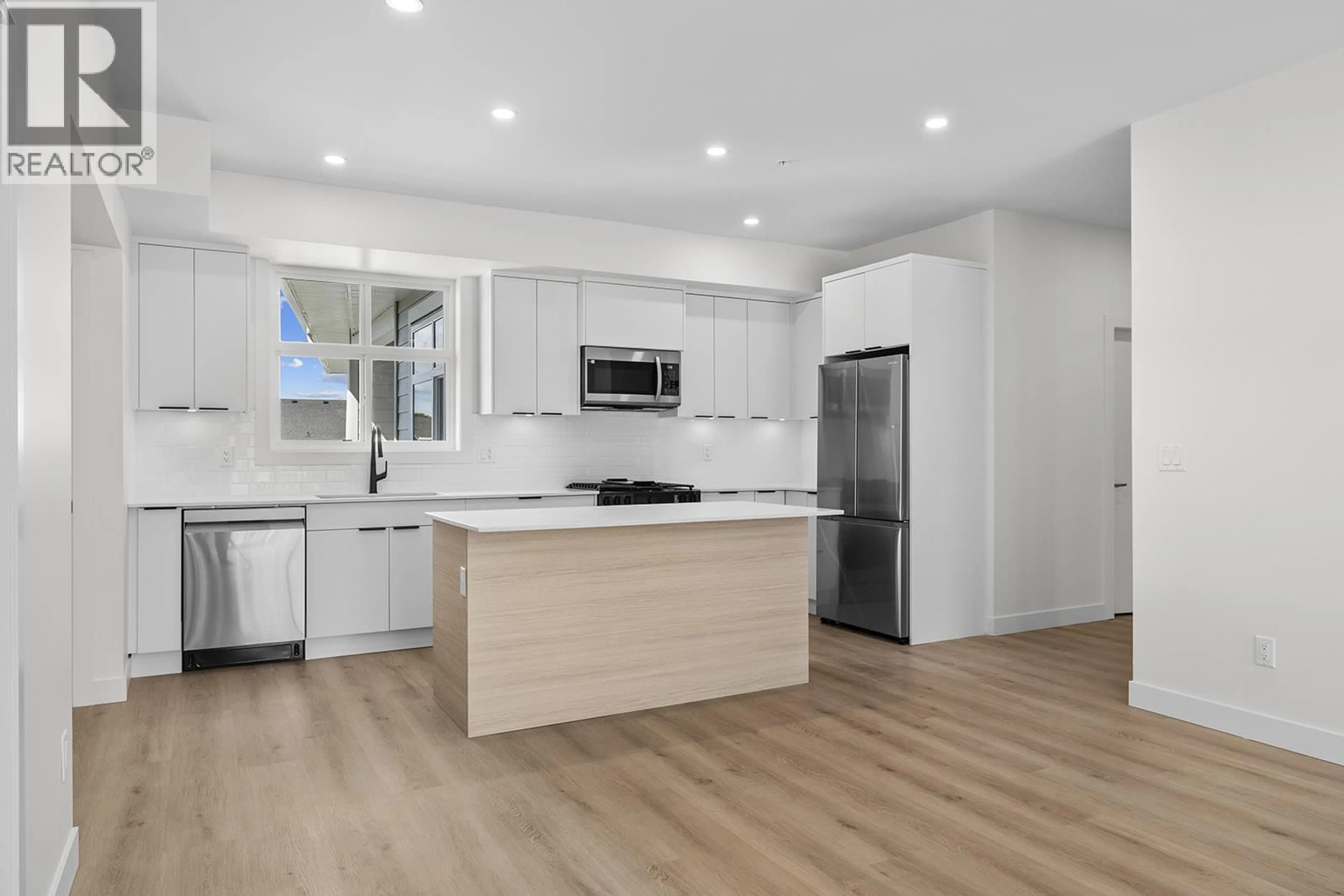 Open concept kitchen, unknown for 204 - 5300 MAIN STREET, Kelowna British Columbia V1W0C1