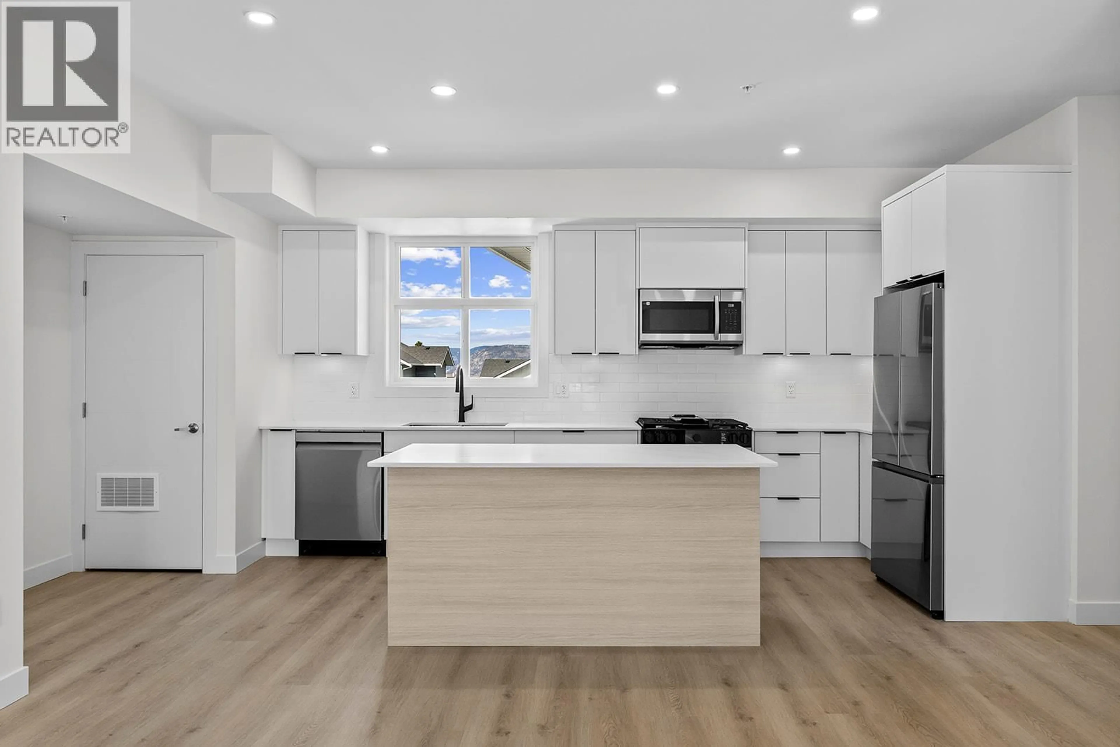 Open concept kitchen, unknown for 204 - 5300 MAIN STREET, Kelowna British Columbia V1W0C1