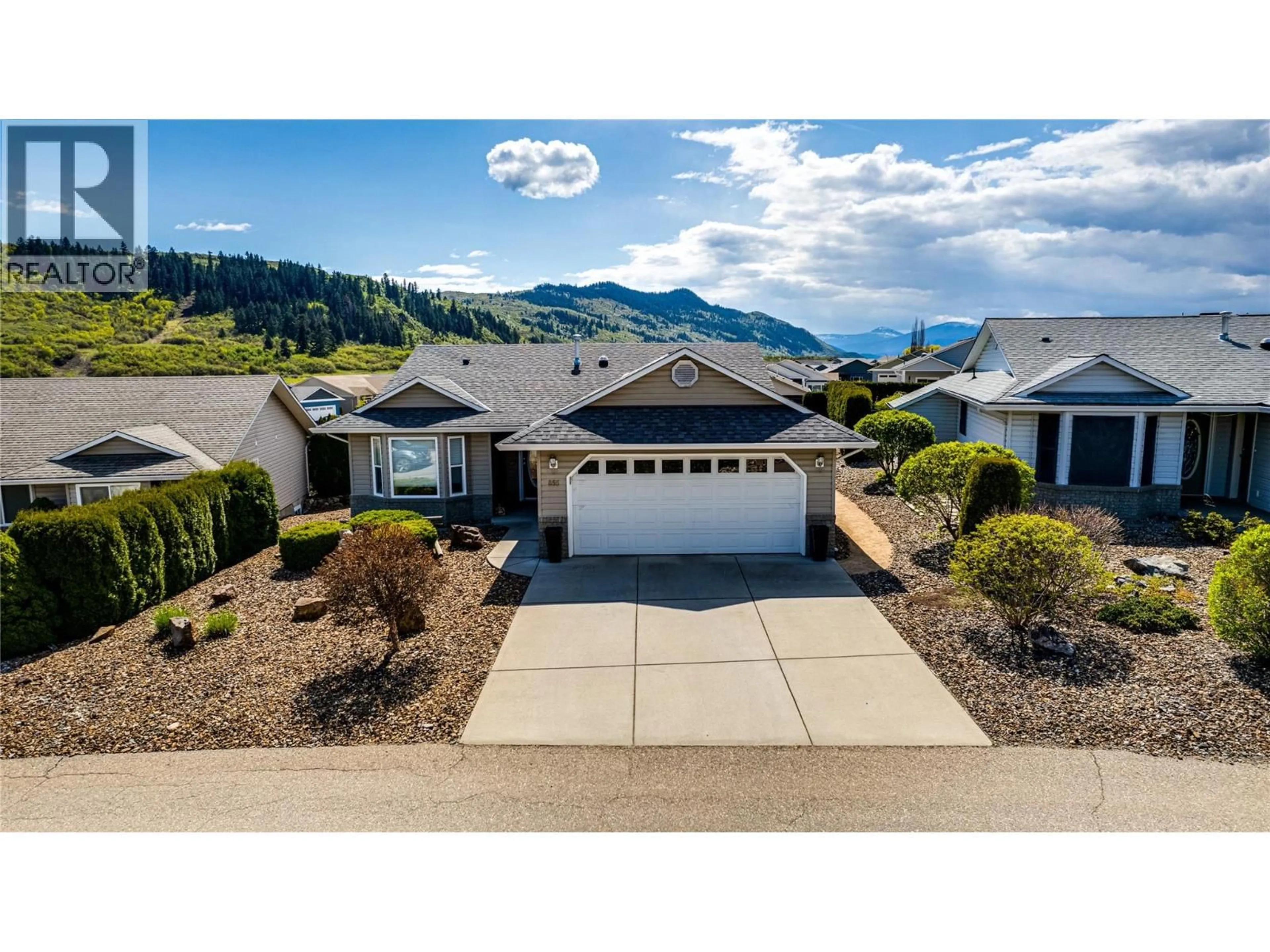 A pic from outside/outdoor area/front of a property/back of a property/a pic from drone, mountain view for 855 8 AVENUE, Vernon British Columbia V1H1Z1