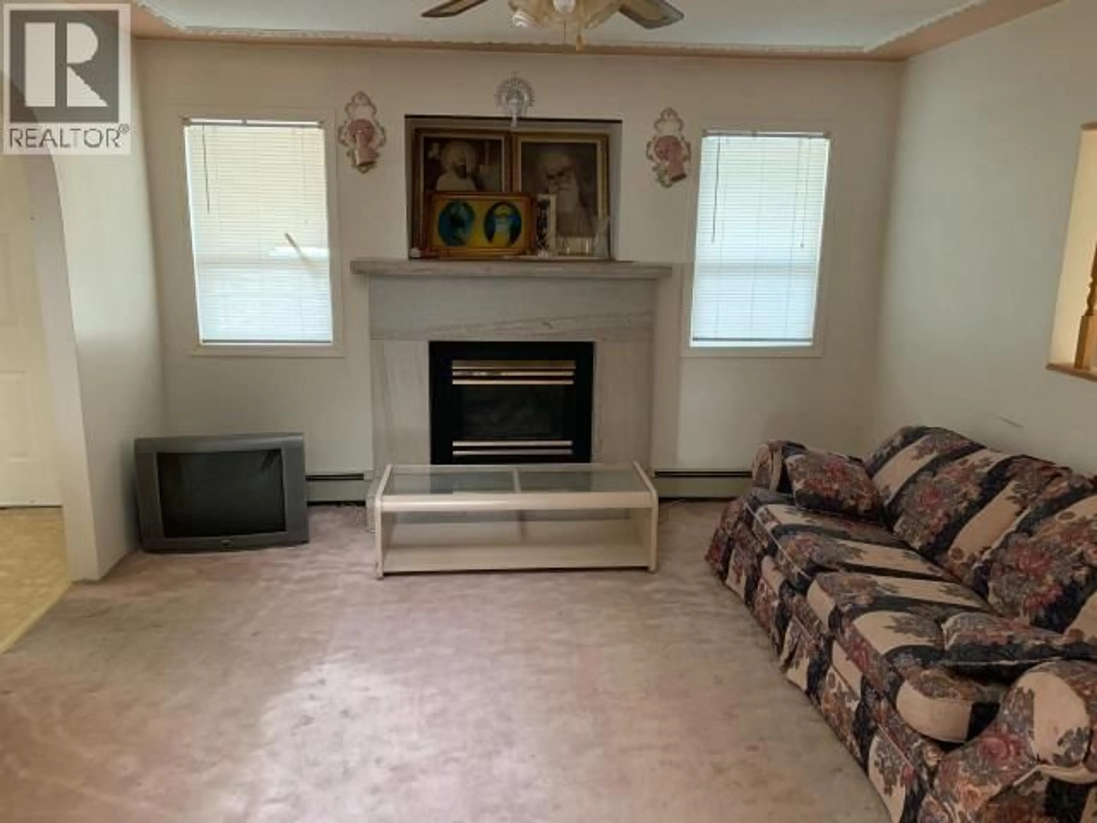 Living room with furniture, unknown for 2651 COUTLEE AVENUE, Merritt British Columbia V1K1B8
