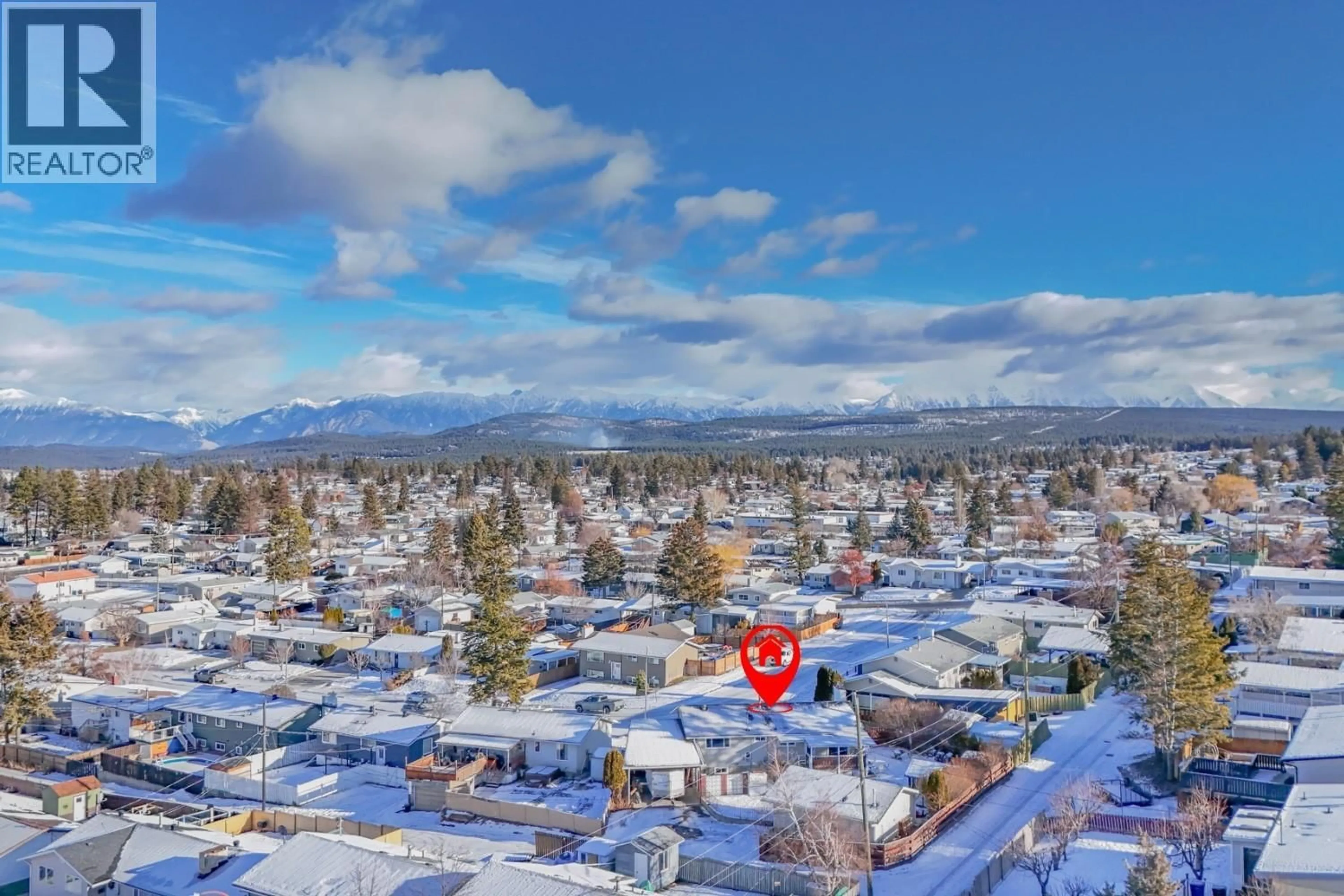 A pic from outside/outdoor area/front of a property/back of a property/a pic from drone, mountain view for 1405 2A AVENUE SOUTH, Cranbrook British Columbia V1C2B6
