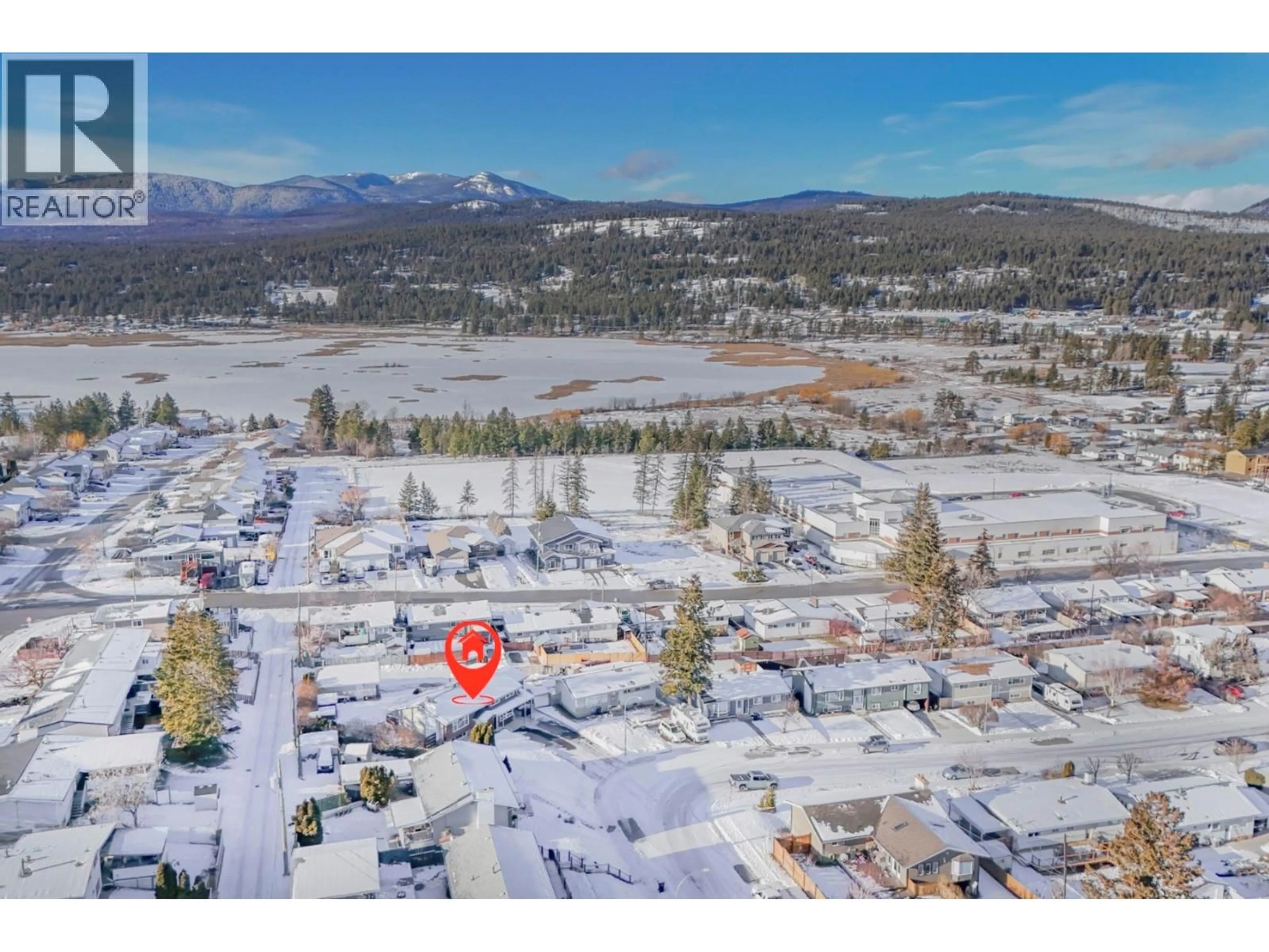 A pic from outside/outdoor area/front of a property/back of a property/a pic from drone, mountain view for 1405 2A AVENUE SOUTH, Cranbrook British Columbia V1C2B6