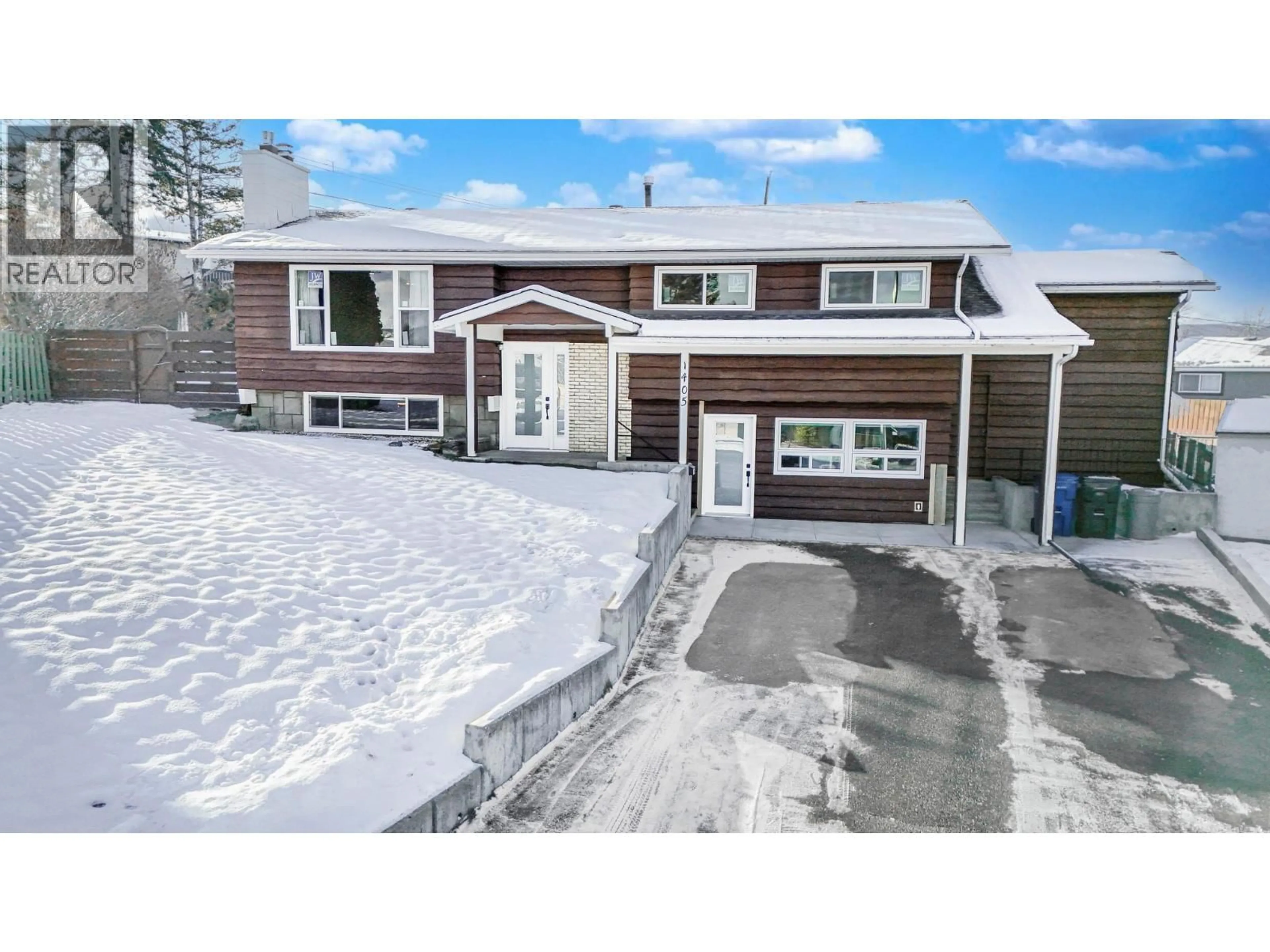 A pic from outside/outdoor area/front of a property/back of a property/a pic from drone, street for 1405 2A AVENUE SOUTH, Cranbrook British Columbia V1C2B6