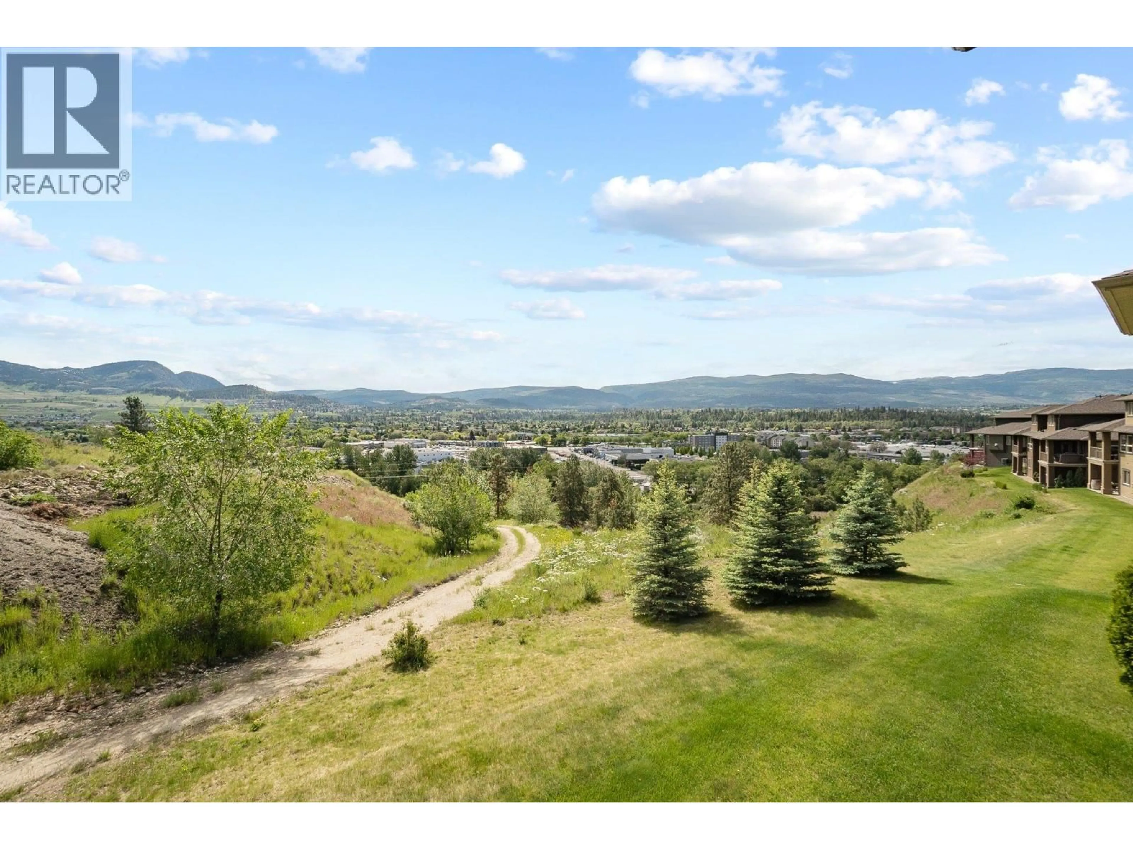 A pic from outside/outdoor area/front of a property/back of a property/a pic from drone, mountain view for 21 - 2421 GLACIER COURT, Kelowna British Columbia V1V3A6