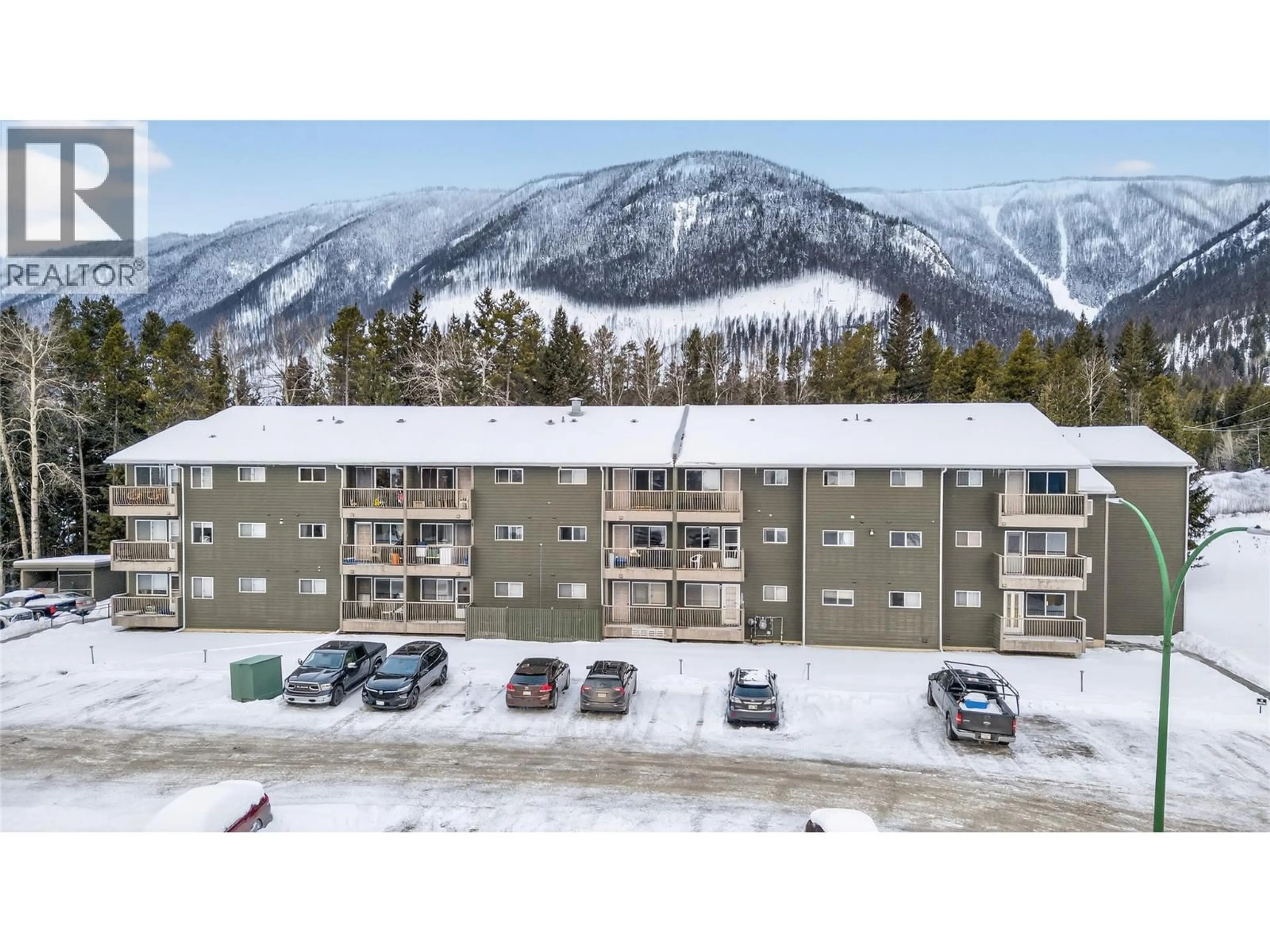 A pic from outside/outdoor area/front of a property/back of a property/a pic from drone, mountain view for 304A - 1299 PONDEROSA DRIVE, Sparwood British Columbia V0B2G2