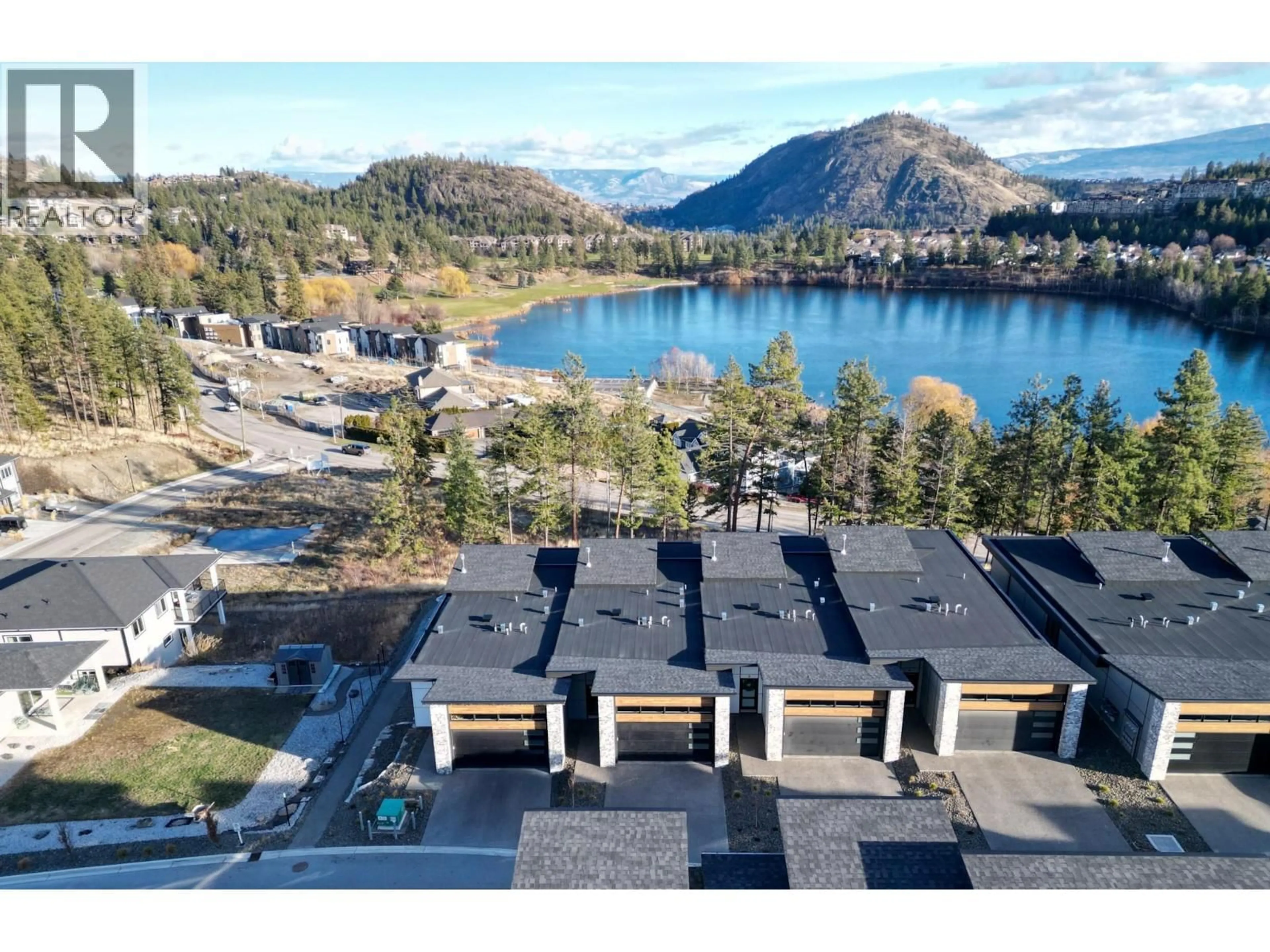 A pic from outside/outdoor area/front of a property/back of a property/a pic from drone, water/lake/river/ocean view for 2 - 2835 CANYON CREST DRIVE, West Kelowna British Columbia V4T0E3