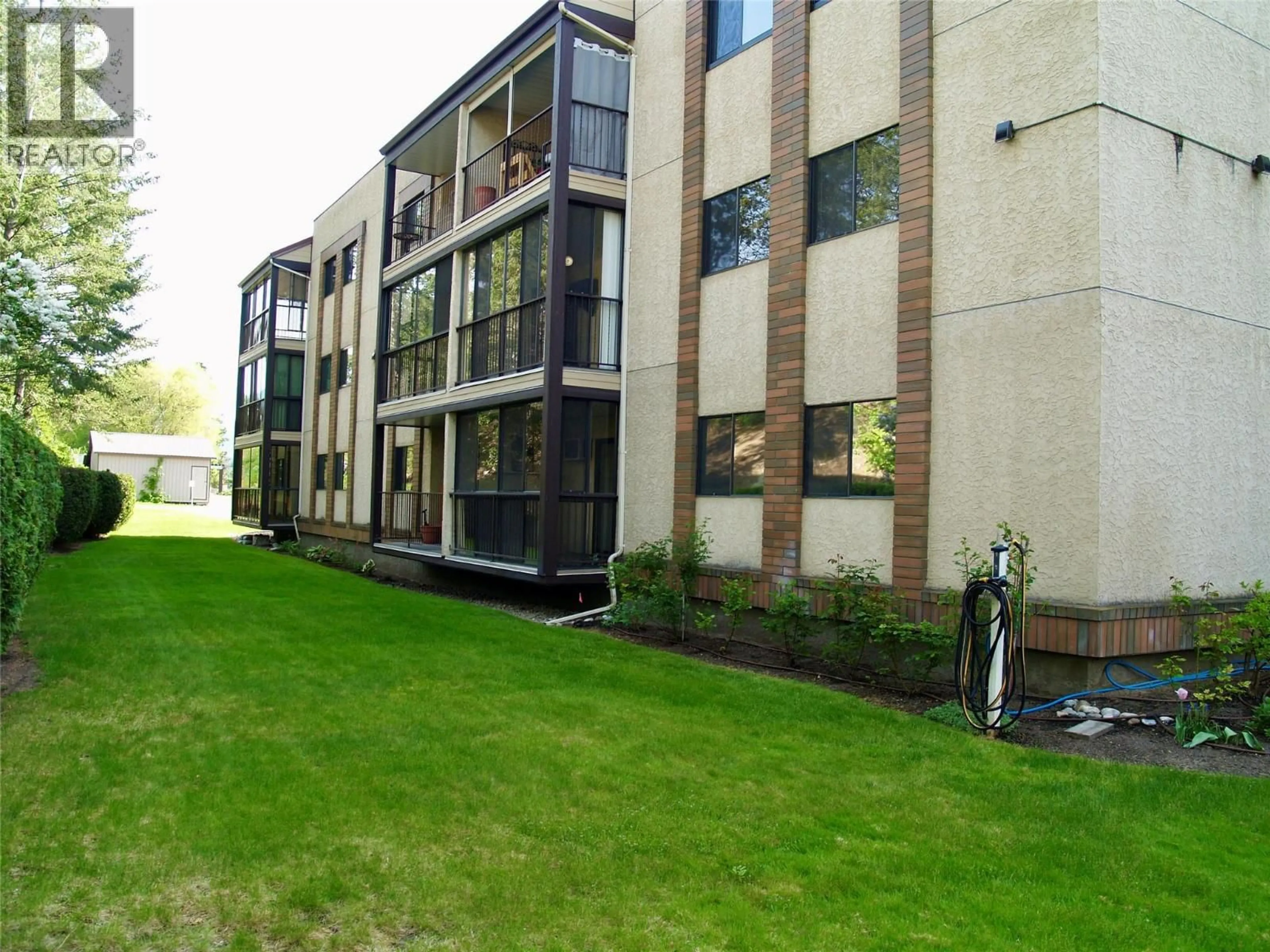A pic from outside/outdoor area/front of a property/back of a property/a pic from drone, building for 121 - 489 HIGHWAY 33 OTHER WEST, Kelowna British Columbia V1X1Y2