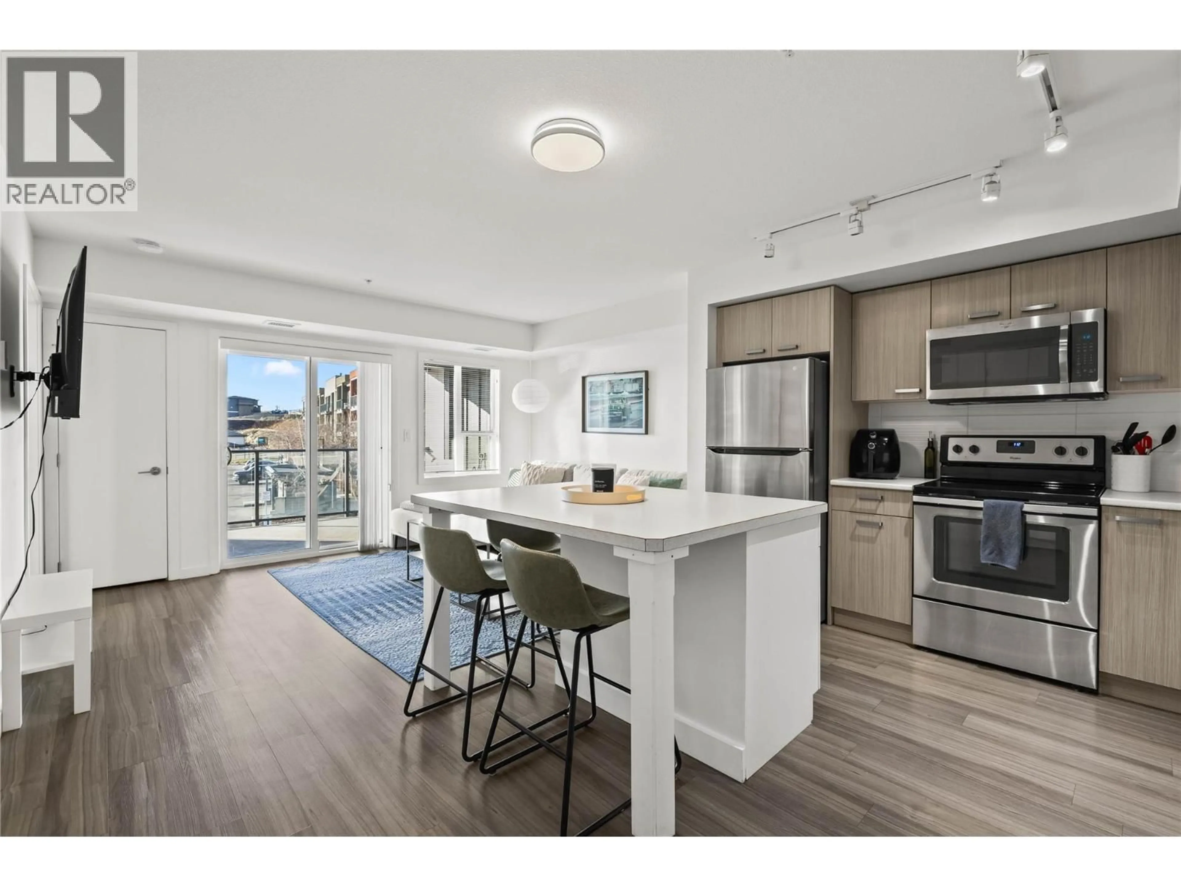 Open concept kitchen, unknown for 203 - 775 ACADEMY WAY, Kelowna British Columbia V1V0A5