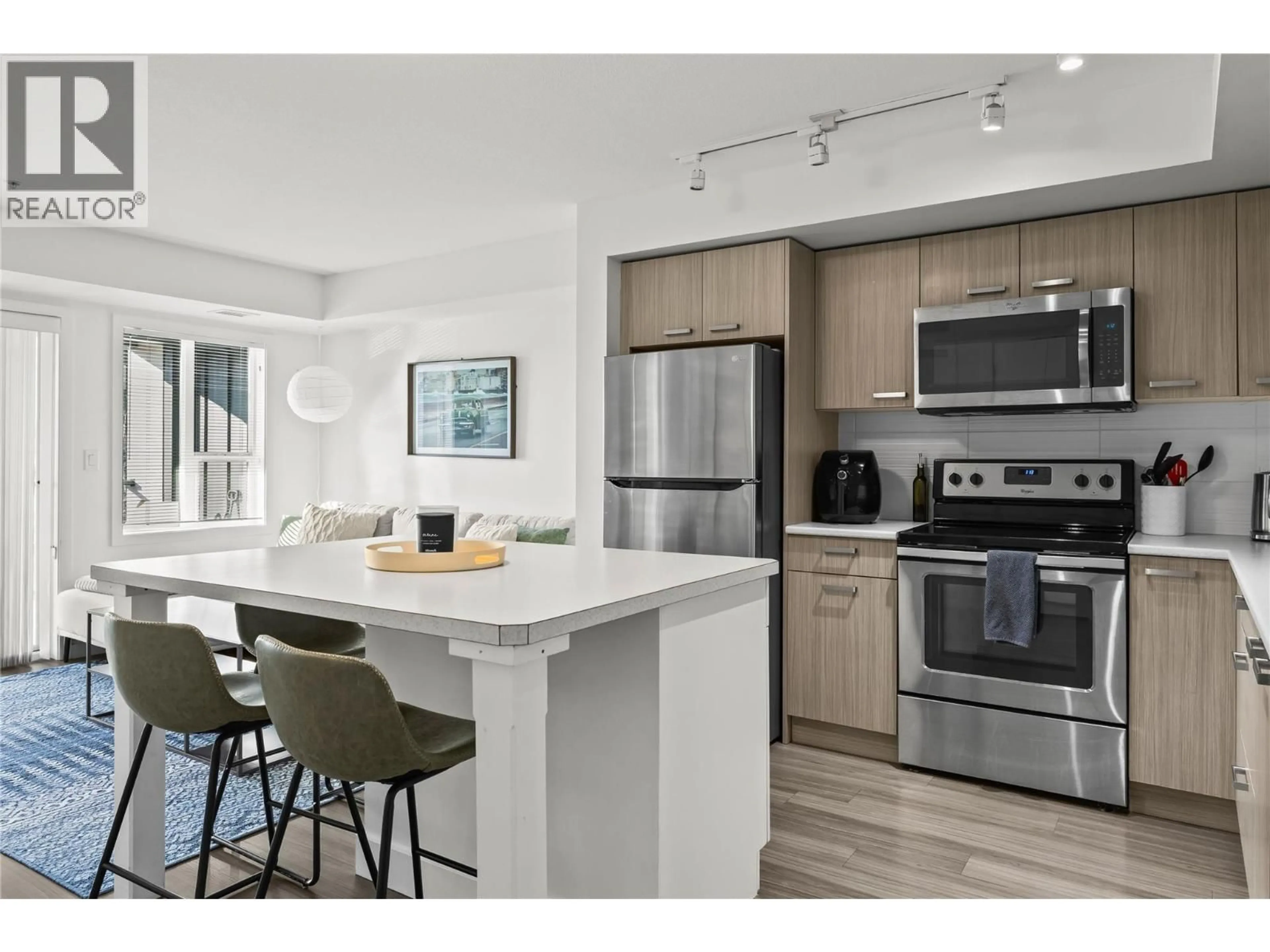 Open concept kitchen, unknown for 203 - 775 ACADEMY WAY, Kelowna British Columbia V1V0A5