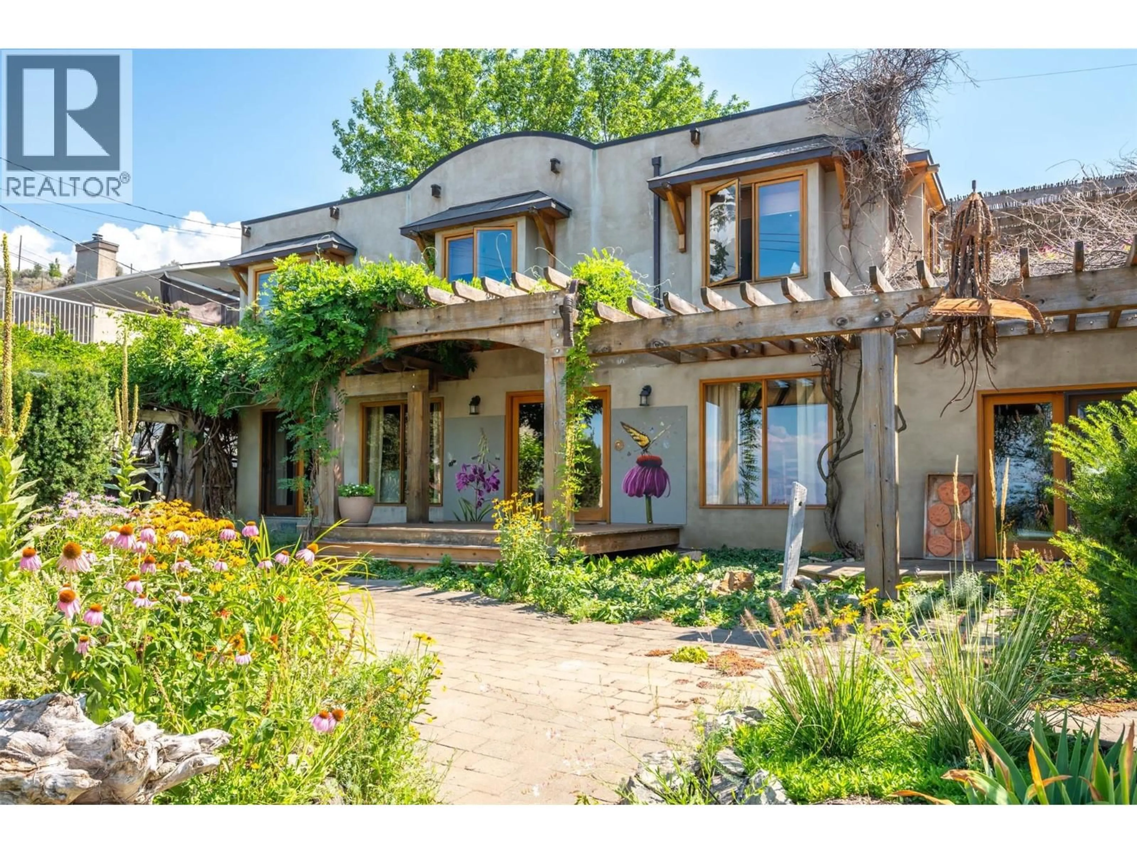 Home with brick exterior material, street for 830 THREE MILE ROAD, Penticton British Columbia V2A8T7