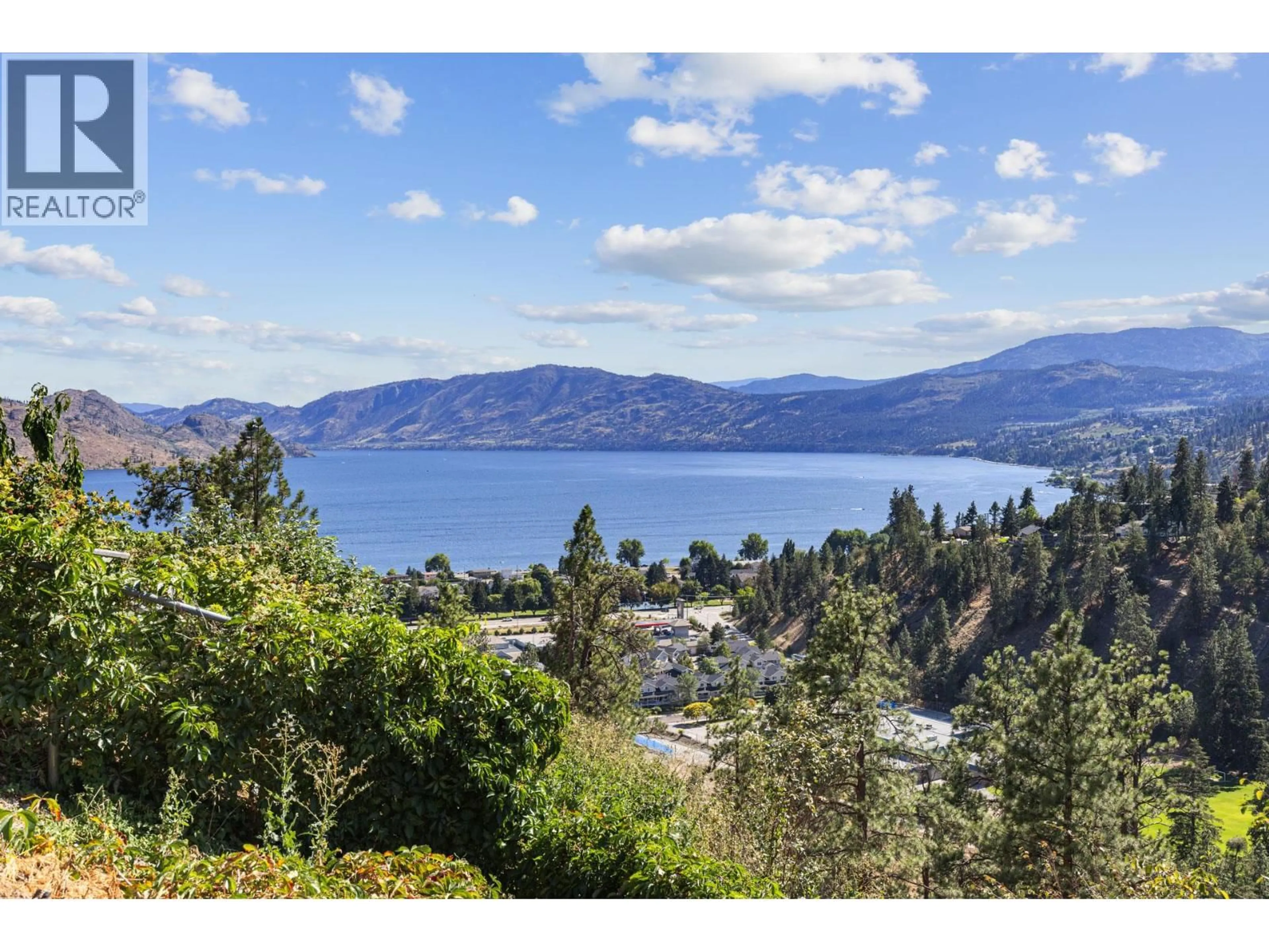A pic from outside/outdoor area/front of a property/back of a property/a pic from drone, water/lake/river/ocean view for 3786 INGLIS PLACE, Peachland British Columbia V0H1X2