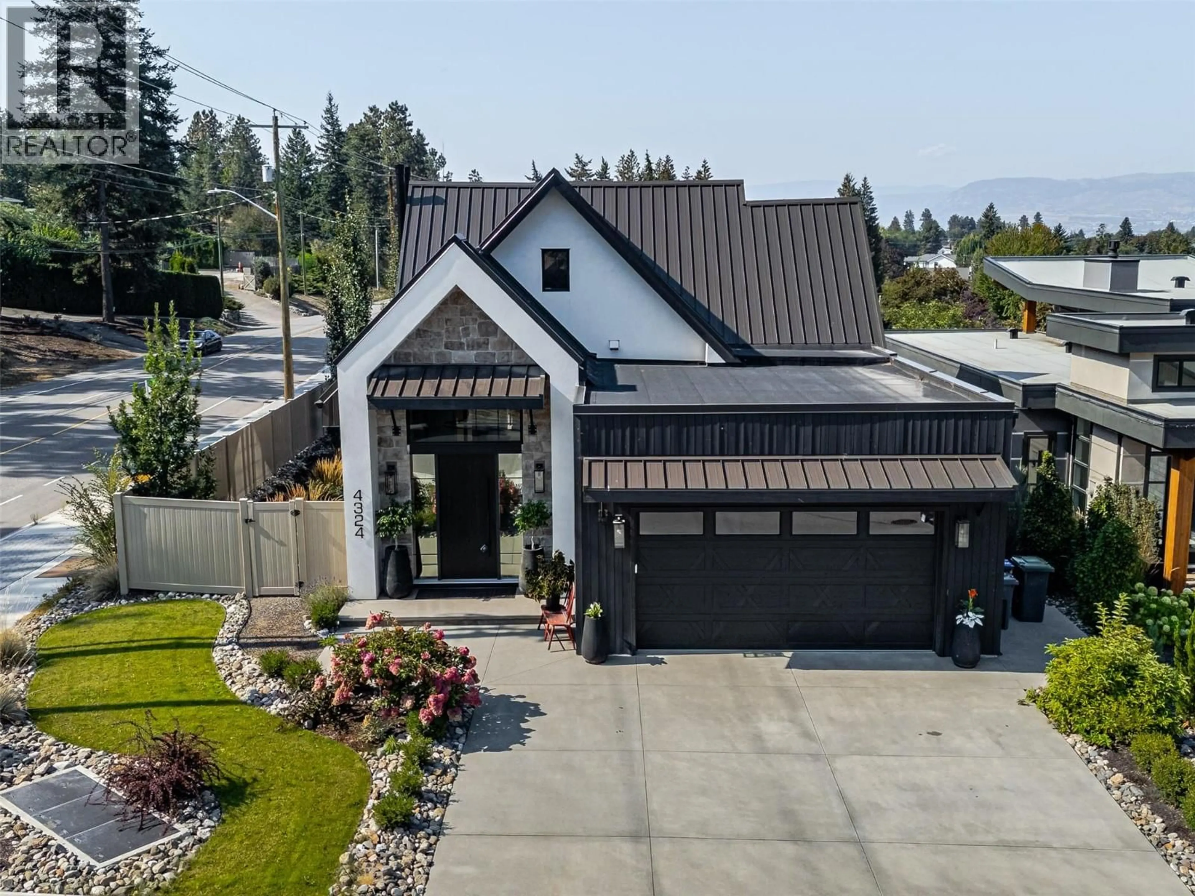 A pic from outside/outdoor area/front of a property/back of a property/a pic from drone, street for 4324 RUSSO STREET, Kelowna British Columbia V1W0B6